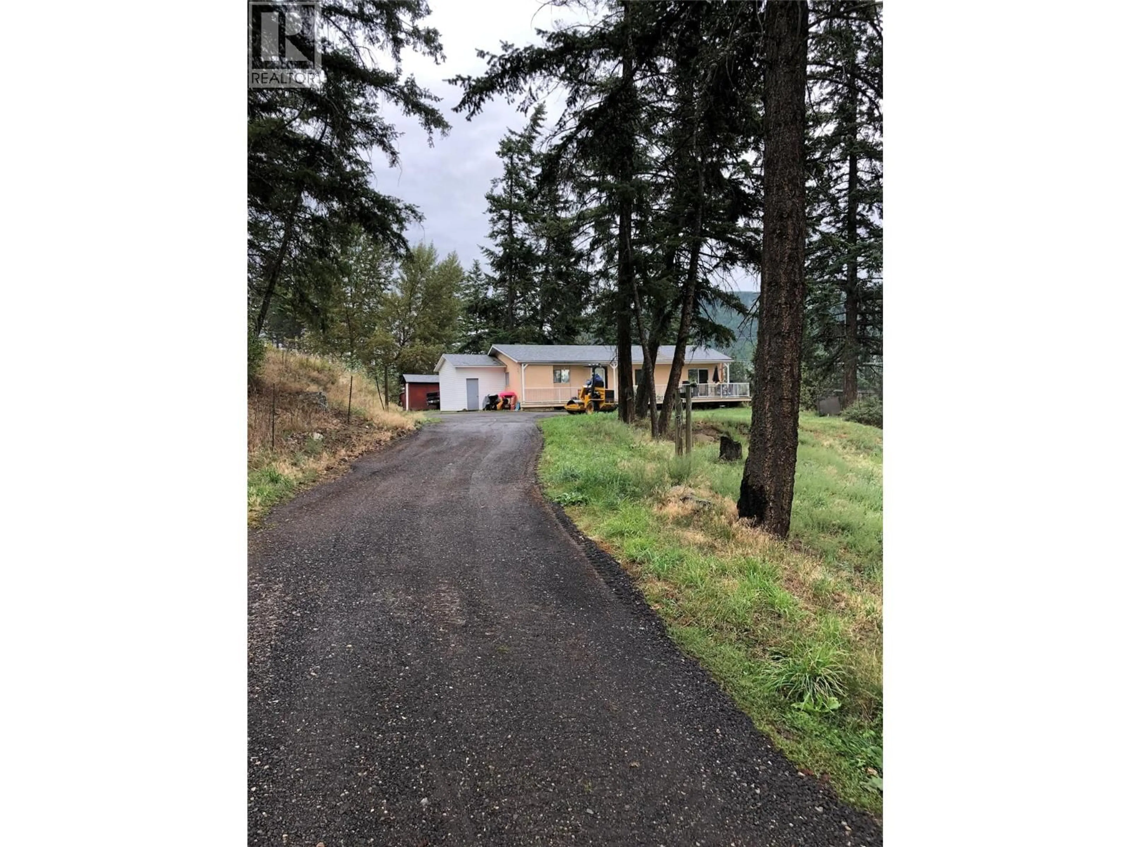 A pic from outside/outdoor area/front of a property/back of a property/a pic from drone, street for 6090 HIGHWAY 33 OTHER, Kelowna British Columbia V1P1H8