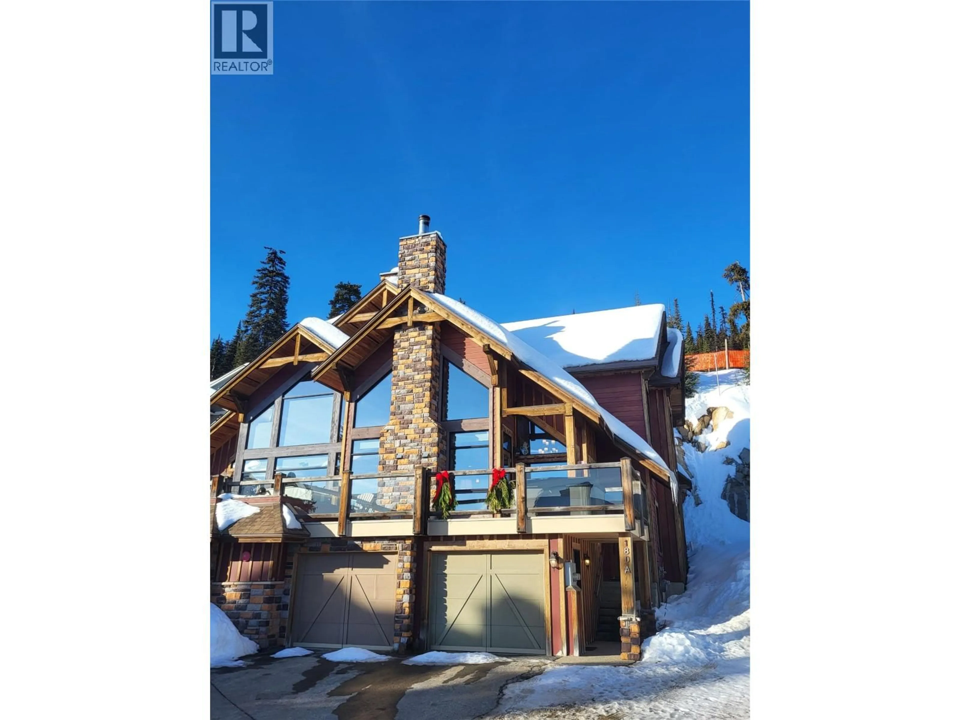 A pic from outside/outdoor area/front of a property/back of a property/a pic from drone, building for 180A GRIZZLY RIDGE TRAIL, Big White British Columbia V1P1P3