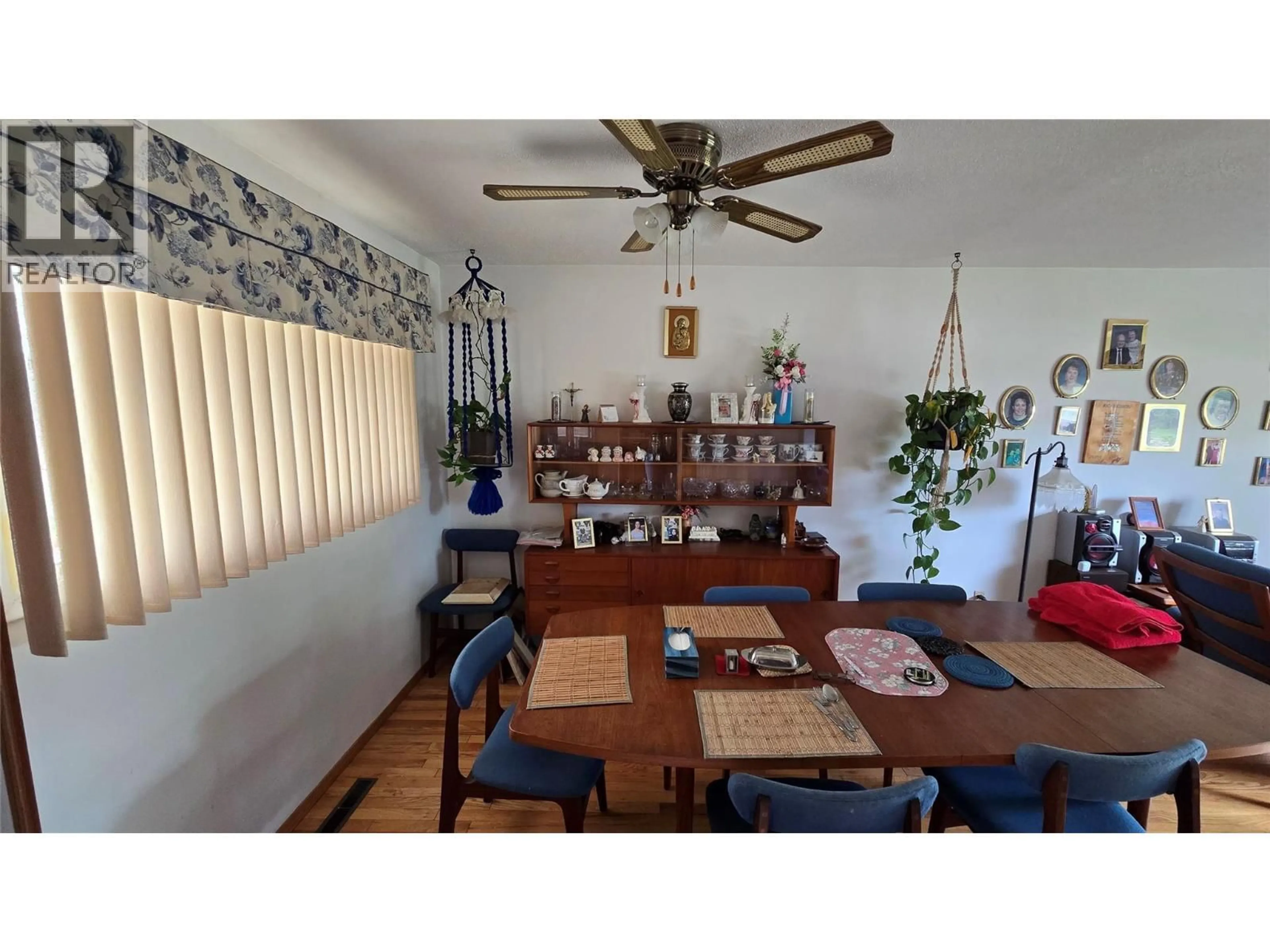 Dining room, wood/laminate floor for 9016 LYMAN DRIVE, Dawson Creek British Columbia V1G3M9