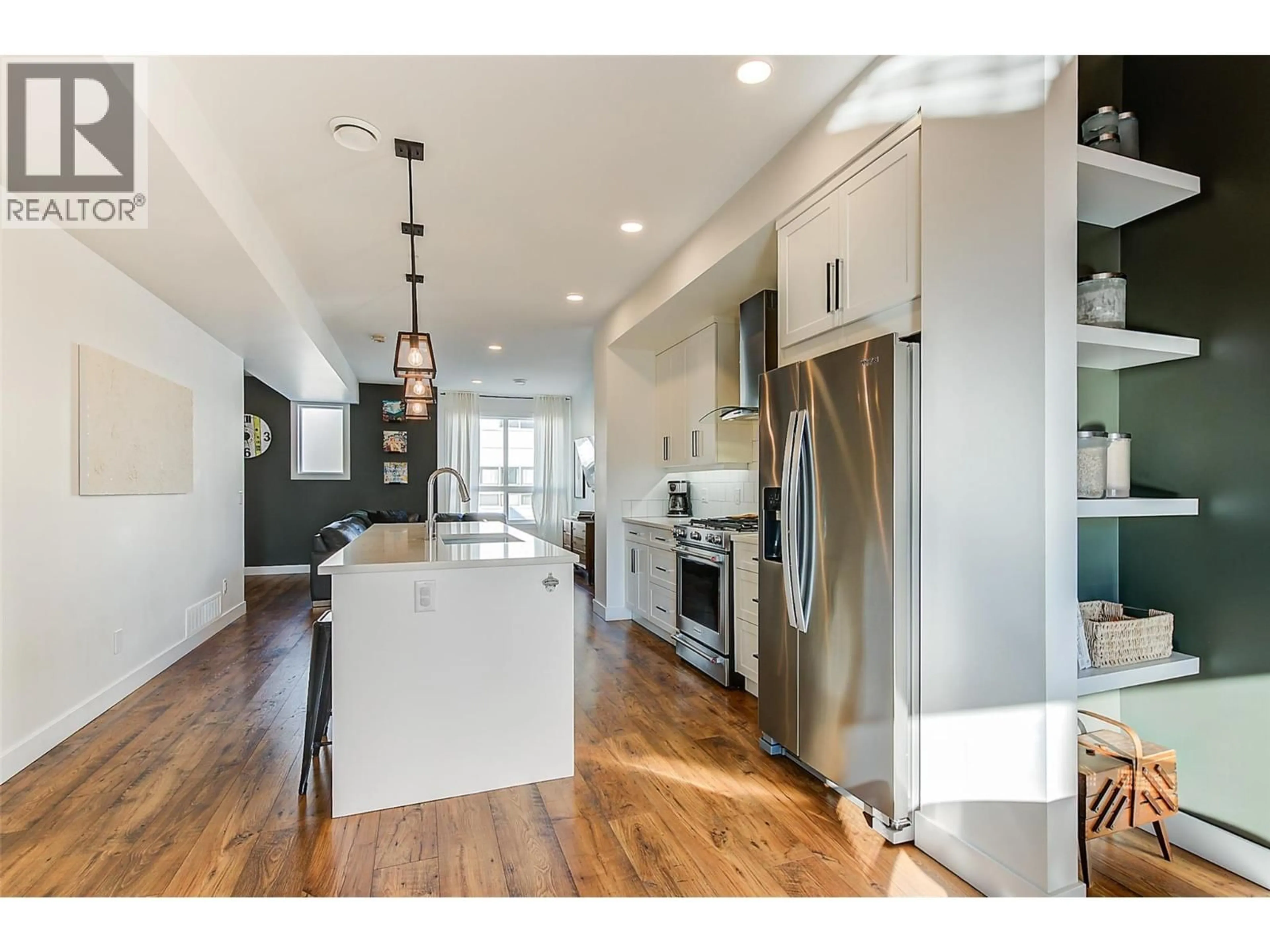 Open concept kitchen, wood/laminate floor for 48 - 12075 OCEOLA ROAD, Lake Country British Columbia V4V1H1