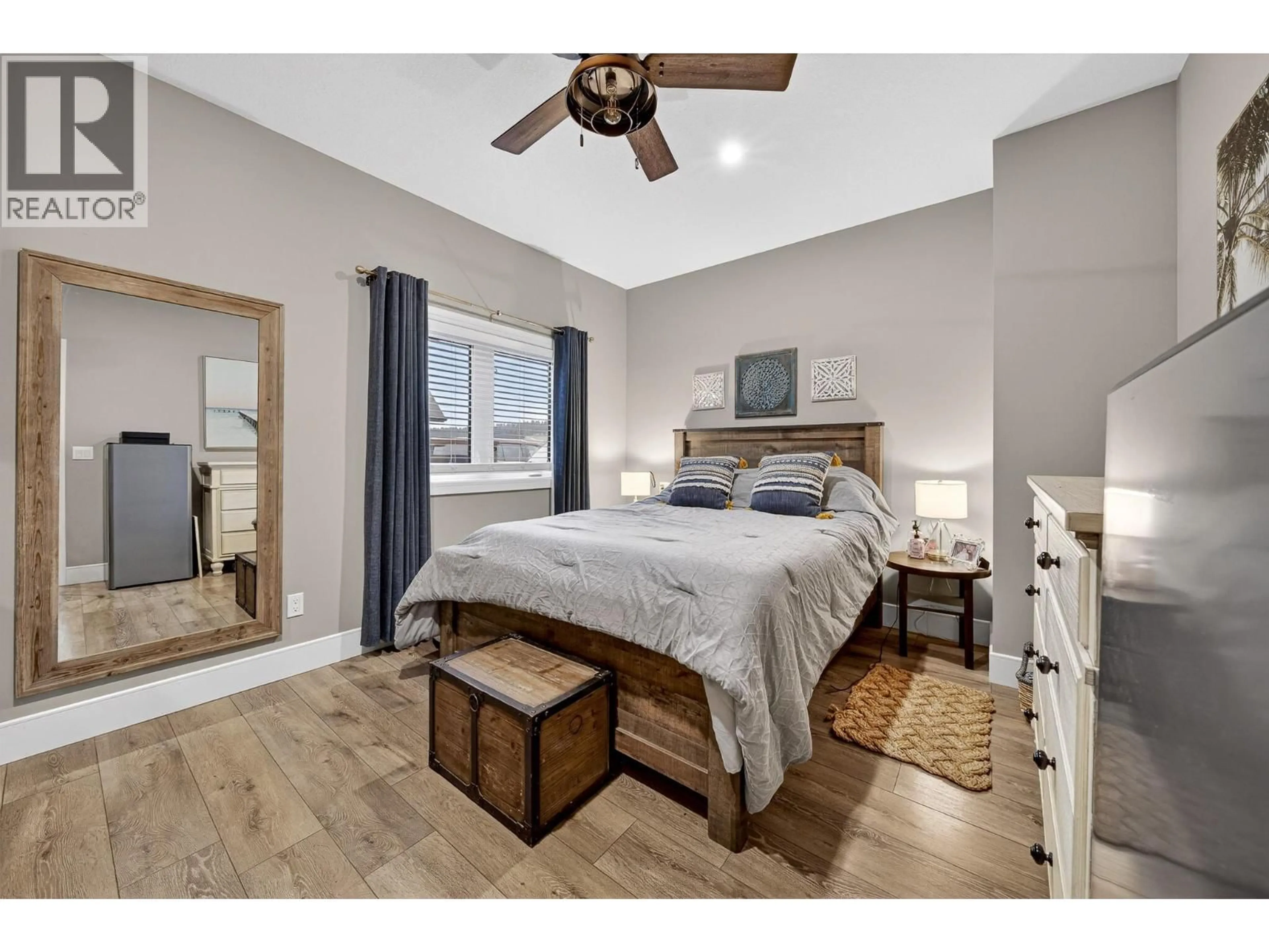 Bedroom with bed, wood/laminate floor for 1651 KOOCANUSA LAKE DRIVE, Lake Koocanusa British Columbia V0B1T4