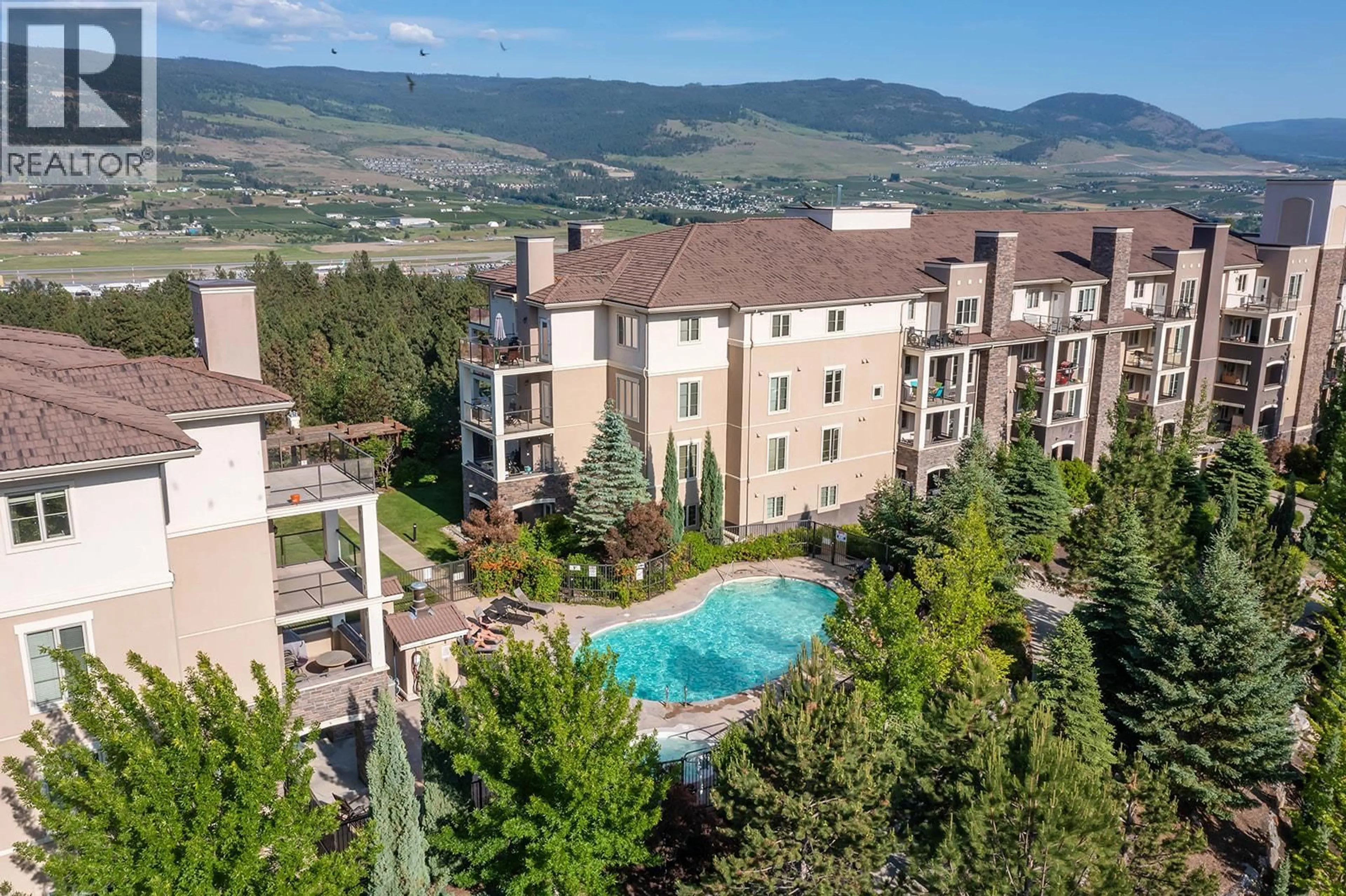 A pic from outside/outdoor area/front of a property/back of a property/a pic from drone, mountain view for 1617 - 1875 COUNTRY CLUB DRIVE, Kelowna British Columbia V1V2W7