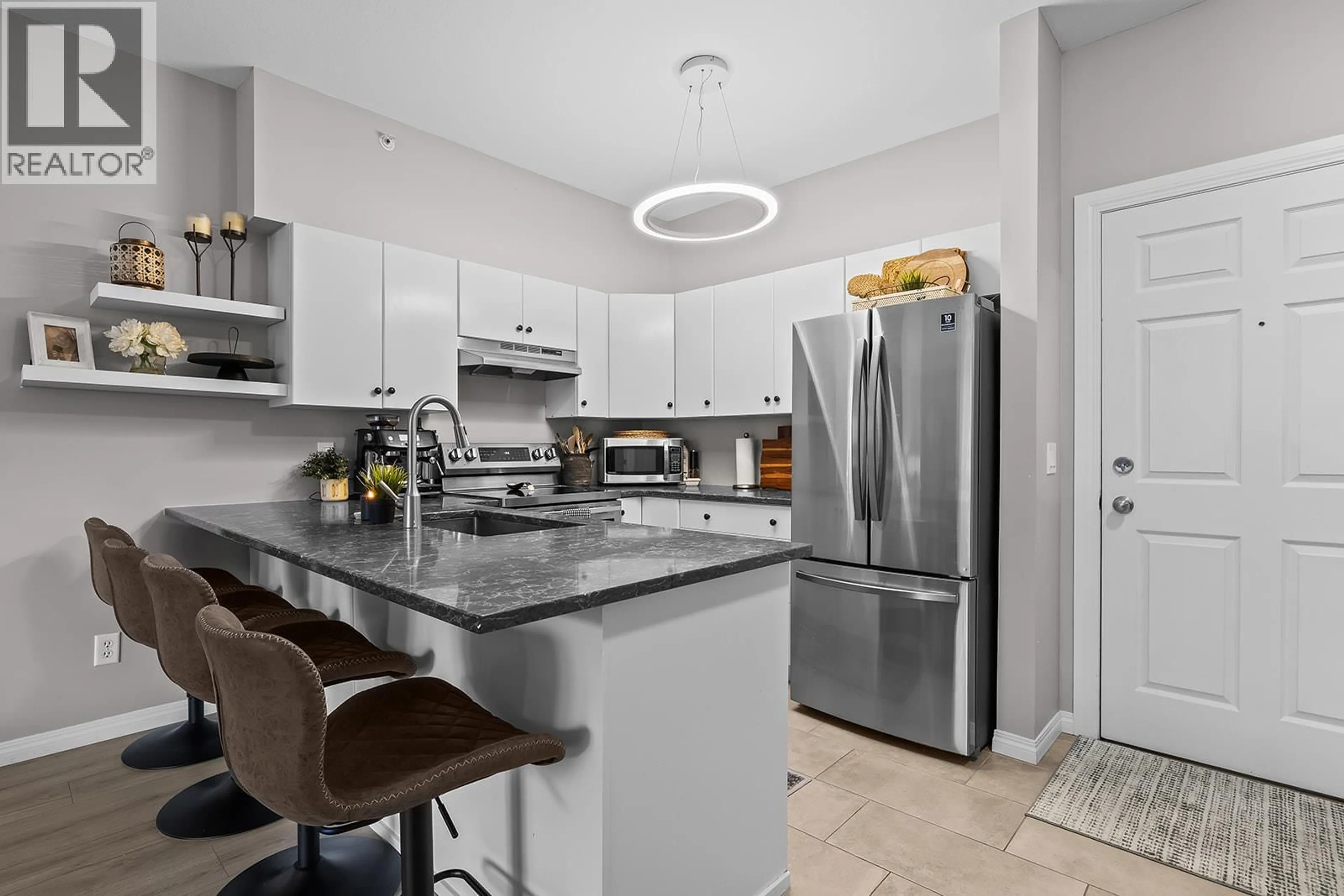 Open concept kitchen, ceramic/tile floor for 1617 - 1875 COUNTRY CLUB DRIVE, Kelowna British Columbia V1V2W7