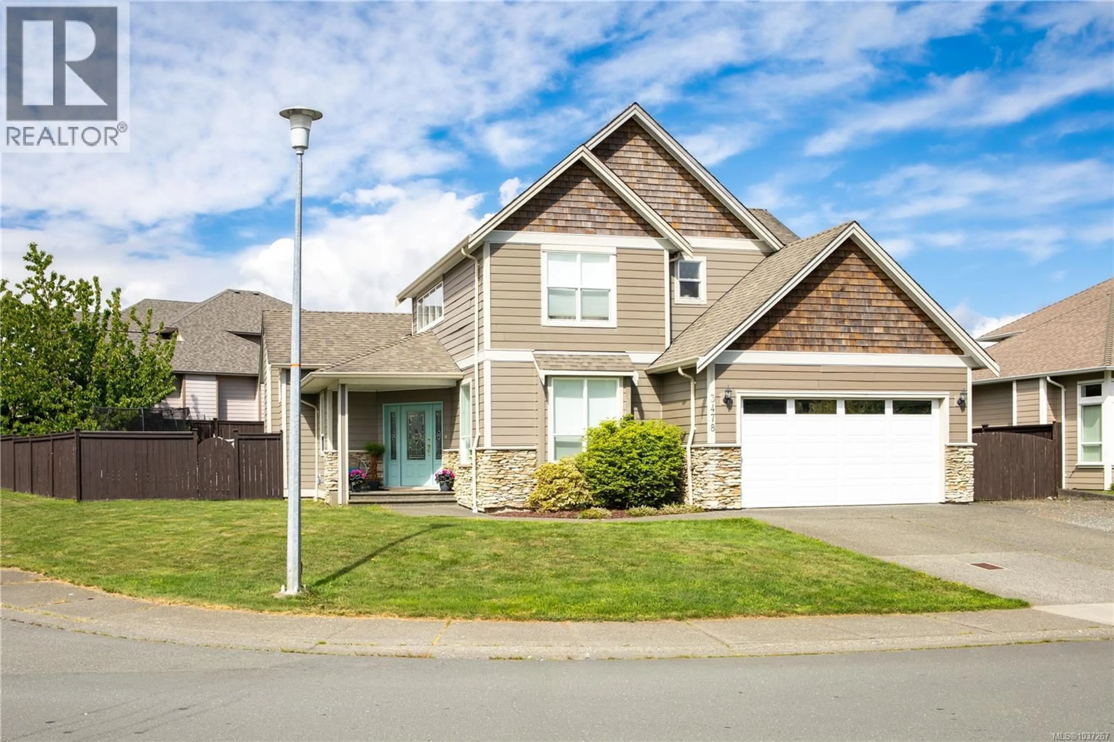 Home with vinyl exterior material, street for 3478 MONTANA DRIVE, Campbell River British Columbia V9W8G8