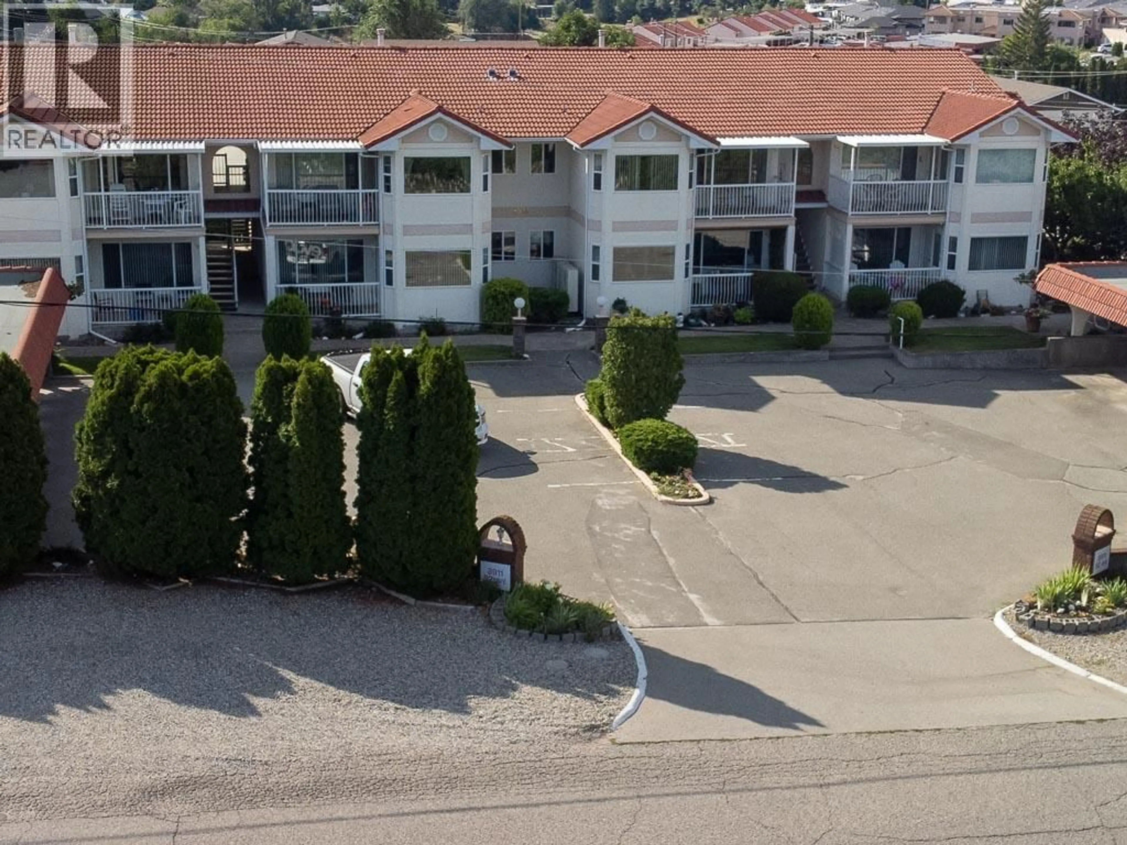 A pic from outside/outdoor area/front of a property/back of a property/a pic from drone, unknown for 104 - 8911 92ND AVENUE, Osoyoos British Columbia V0H1V2