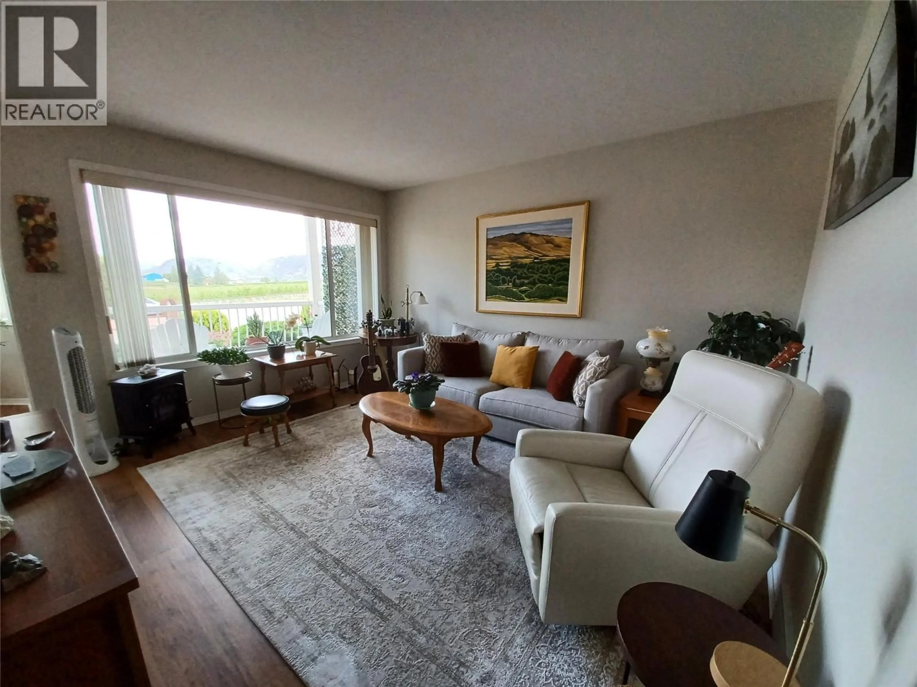 Living room with furniture, unknown for 104 - 8911 92ND AVENUE, Osoyoos British Columbia V0H1V2