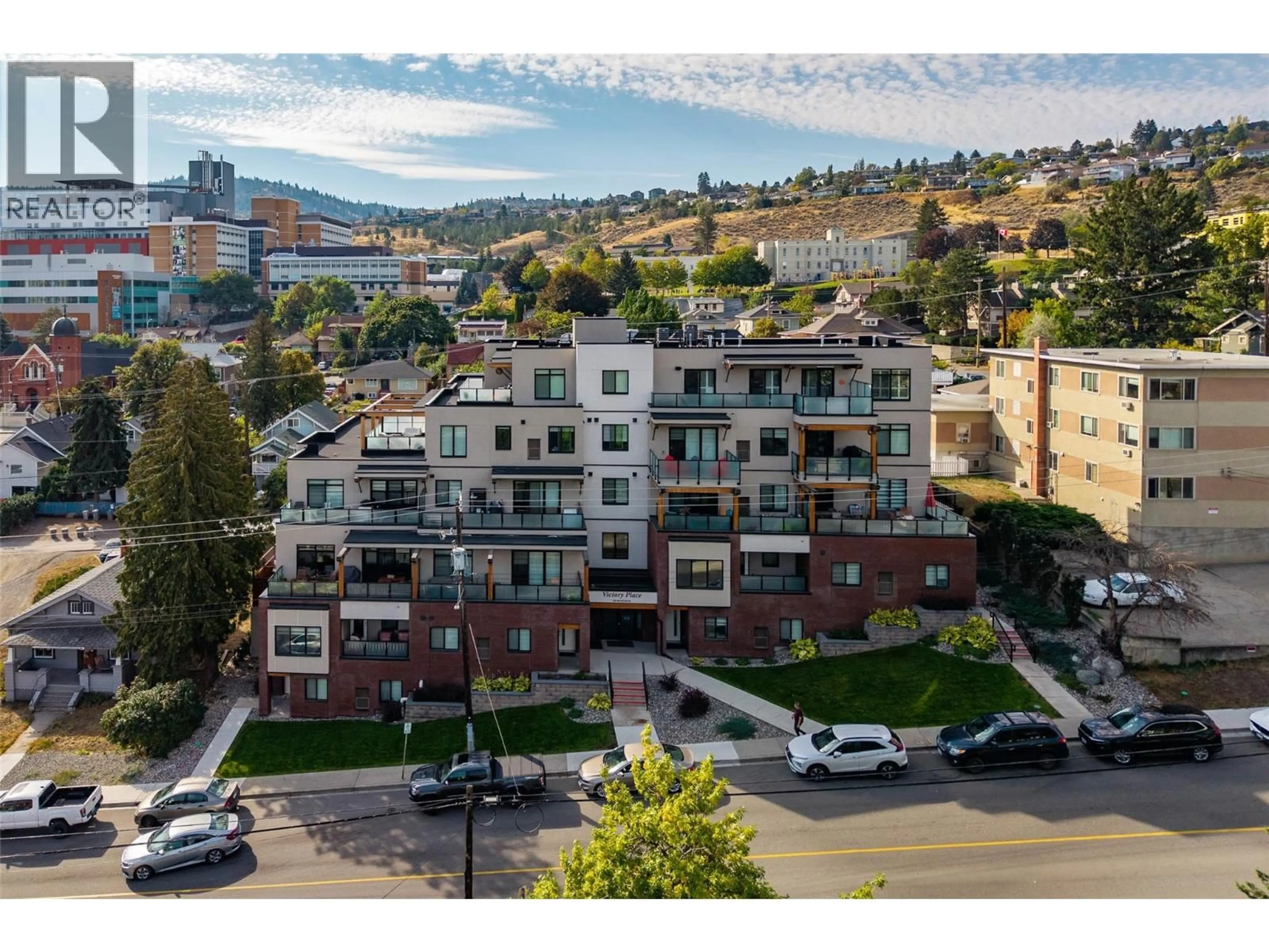 A pic from outside/outdoor area/front of a property/back of a property/a pic from drone, mountain view for 104 - 227 BATTLE STREET, Kamloops British Columbia V2C2L3