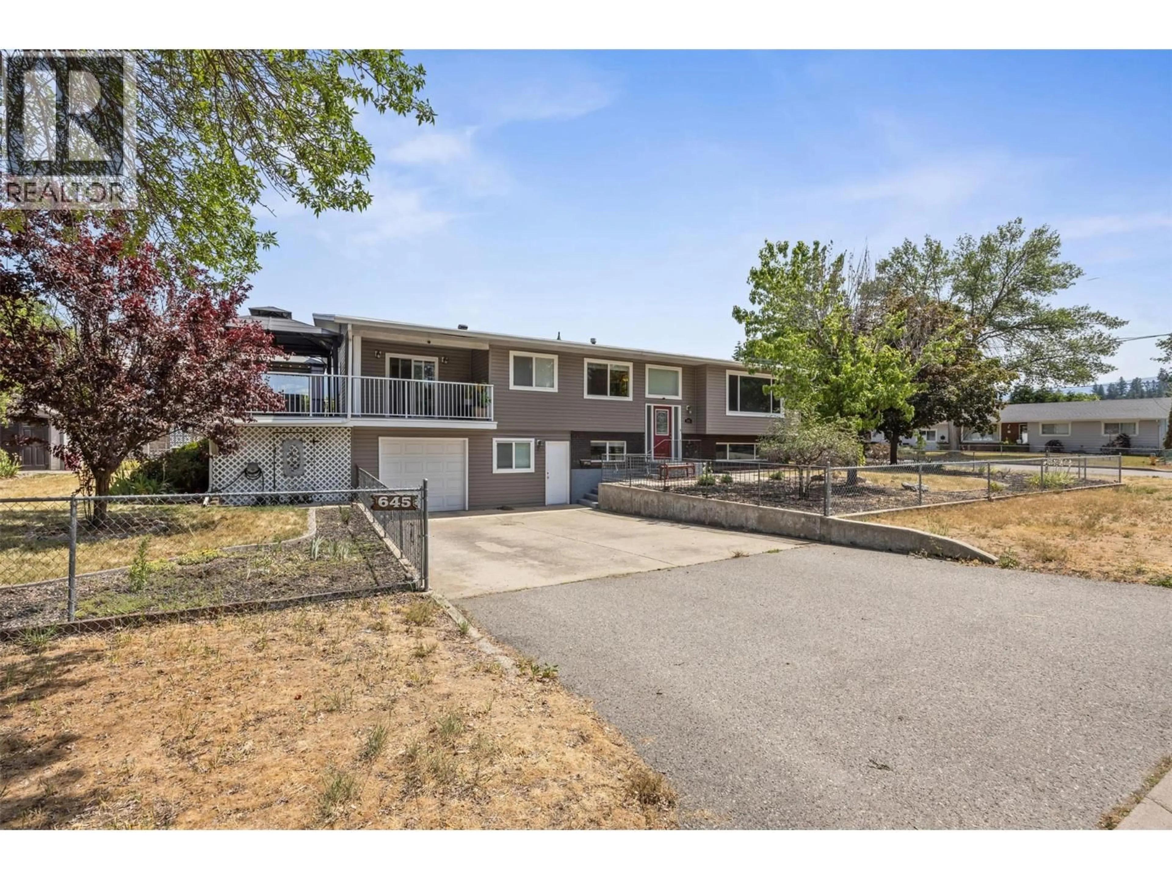 A pic from outside/outdoor area/front of a property/back of a property/a pic from drone, street for 645 MARK ROAD, Kelowna British Columbia V1X5G8
