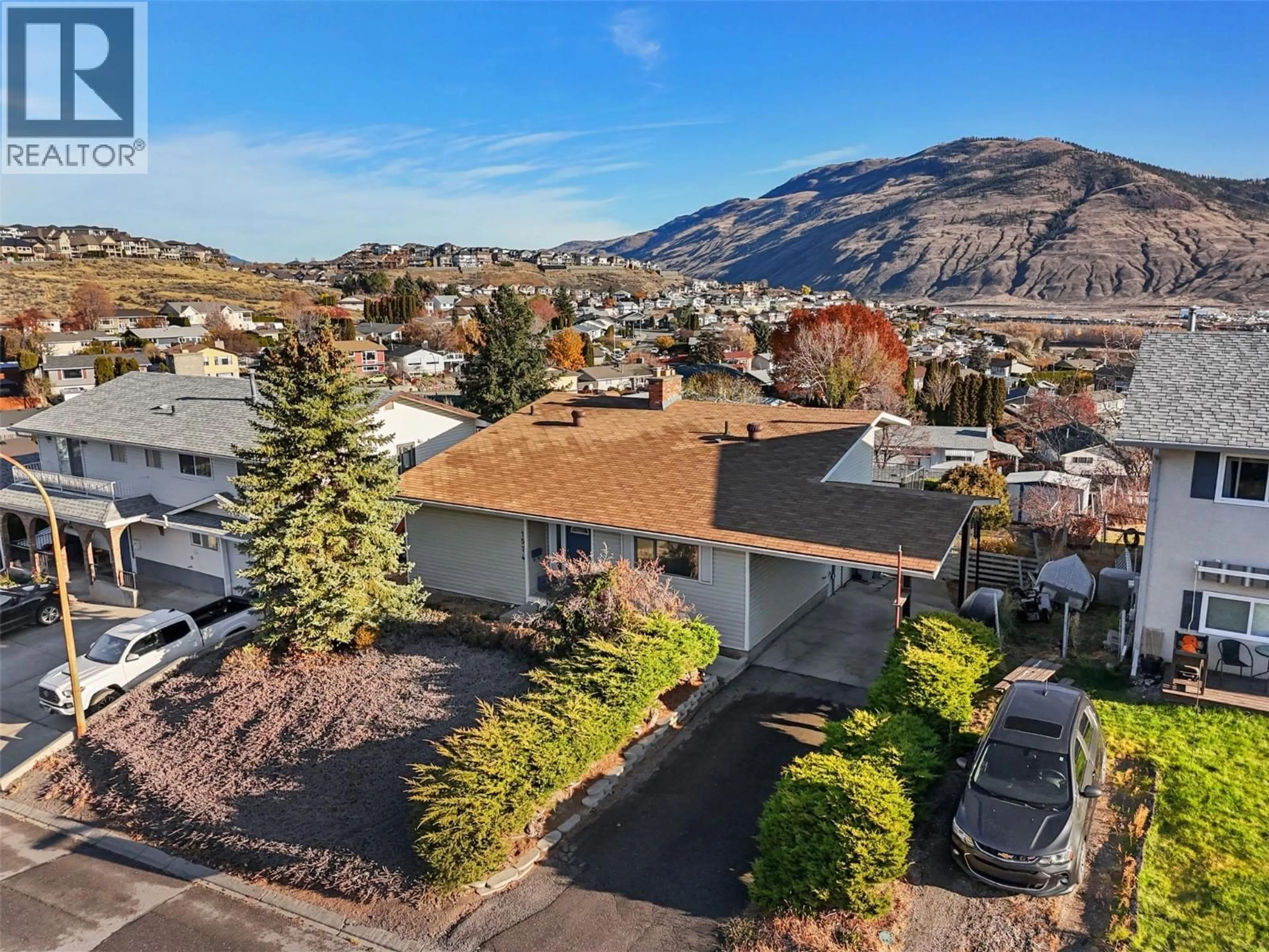 A pic from outside/outdoor area/front of a property/back of a property/a pic from drone, mountain view for 1574 GRIFFIN TERRACE, Kamloops British Columbia V2B7R6