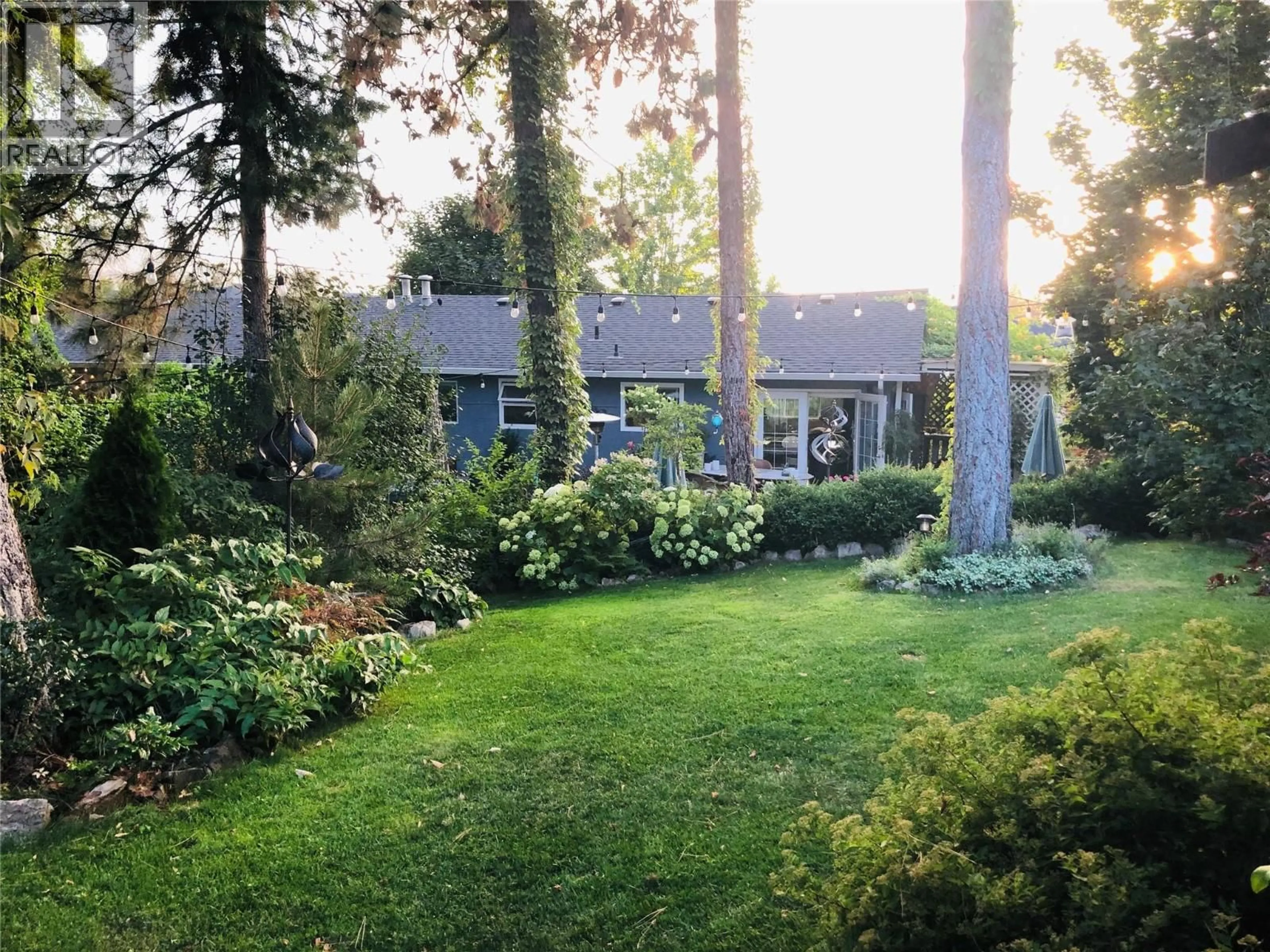 A pic from outside/outdoor area/front of a property/back of a property/a pic from drone, street for 5173 CHUTE LAKE CRESCENT, Kelowna British Columbia V1W4L7