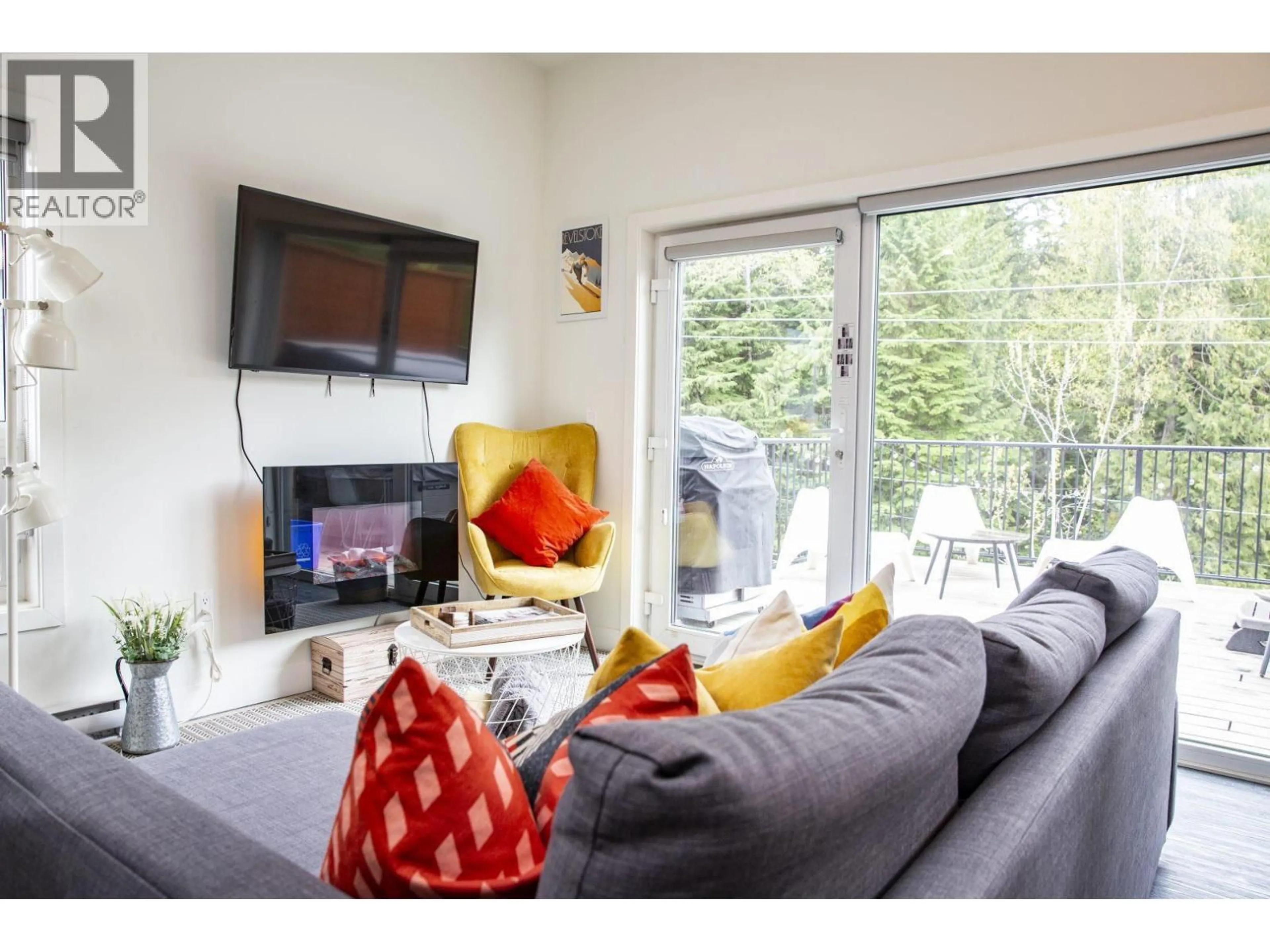 Living room with furniture, unknown for 5204 - 1901 NELS NELSON CRESCENT, Revelstoke British Columbia V0E2S3