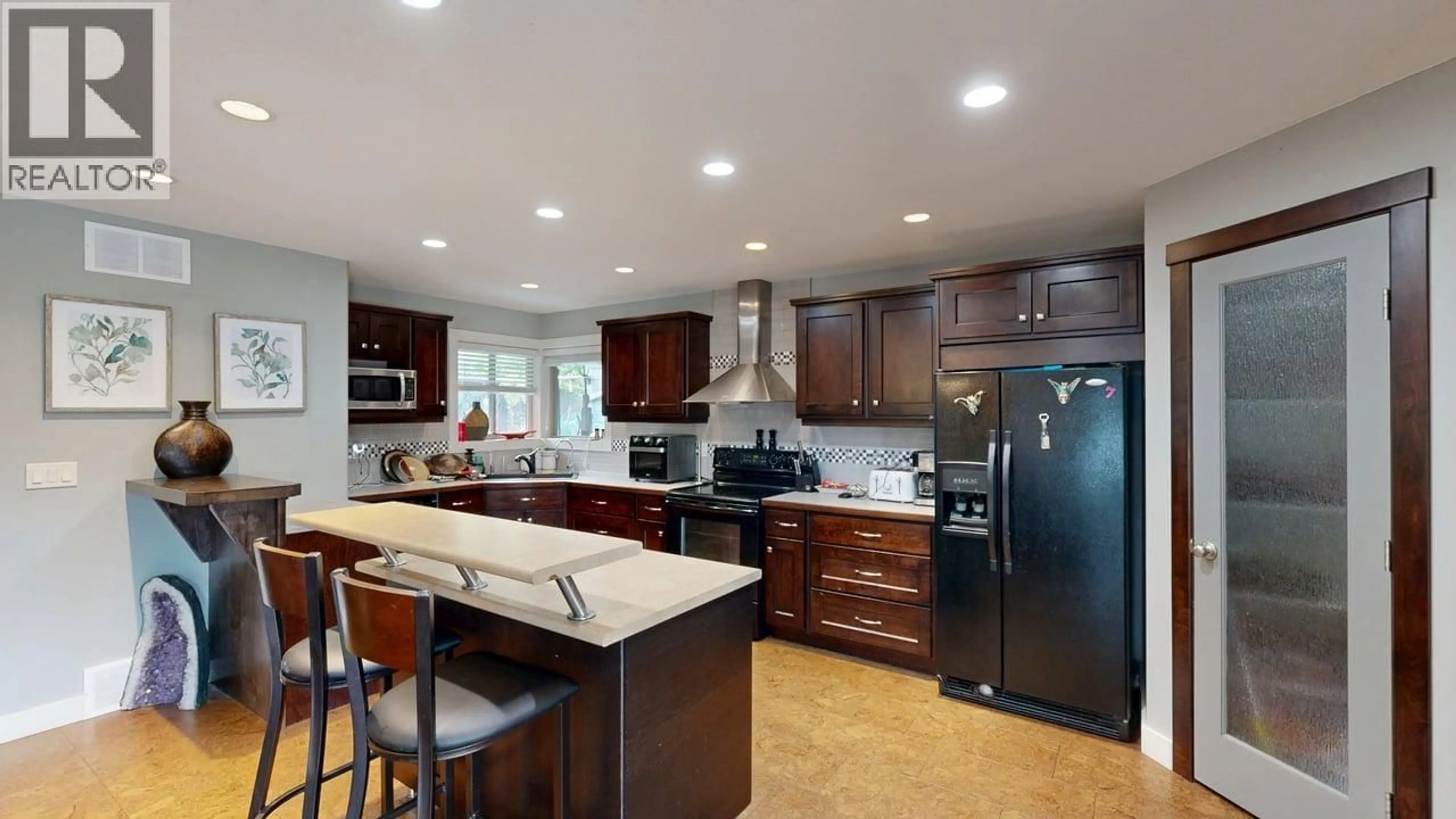 Open concept kitchen, ceramic/tile floor for 7400 SUN PEAKS DRIVE, Vernon British Columbia V1B4C7