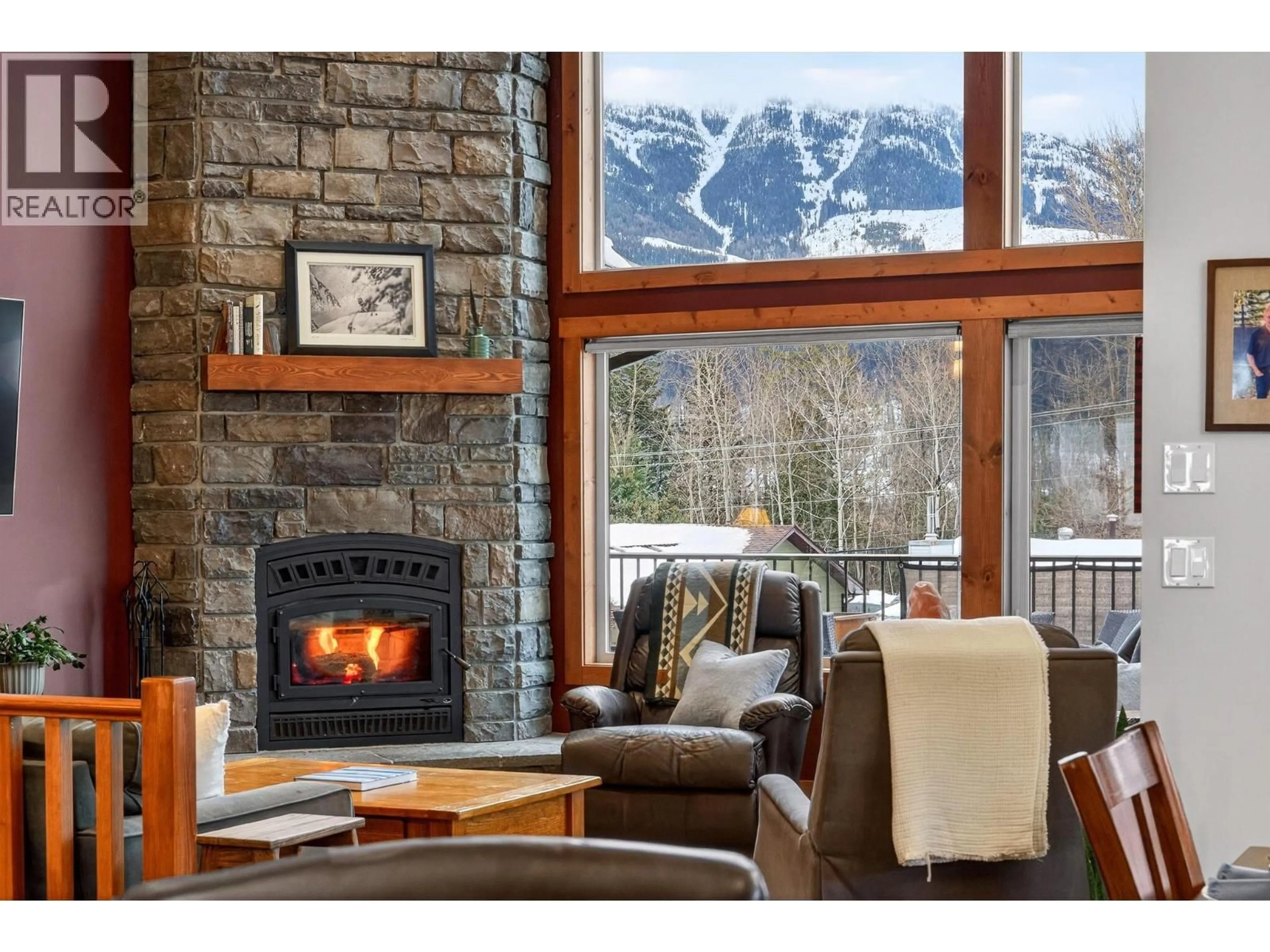 Living room with furniture, wood/laminate floor for 32 ASPEN CRESCENT, Fernie British Columbia V0B1M5