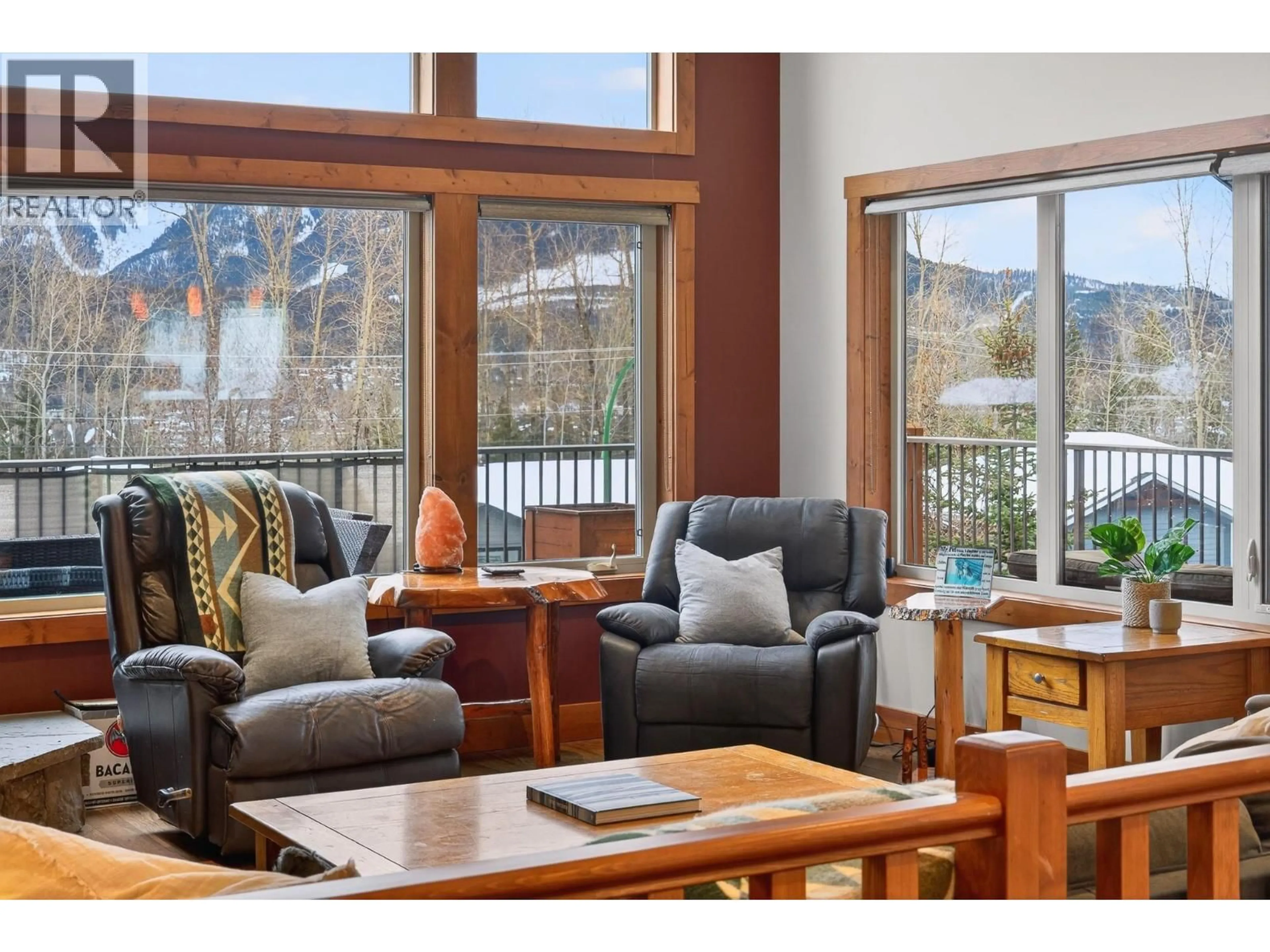 Living room with furniture, wood/laminate floor for 32 ASPEN CRESCENT, Fernie British Columbia V0B1M5