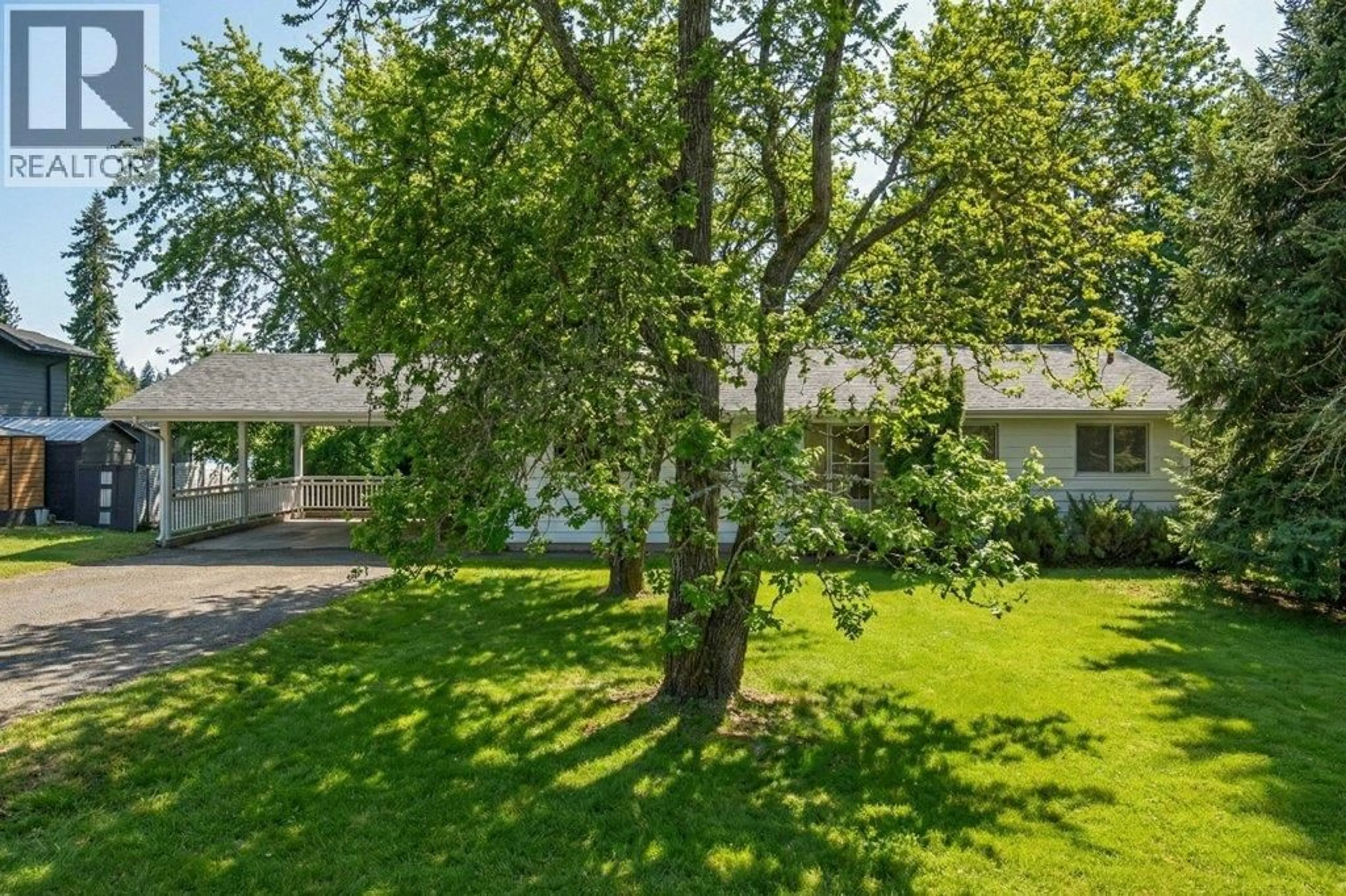 A pic from outside/outdoor area/front of a property/back of a property/a pic from drone, street for 2850 30 AVENUE NORTHEAST, Salmon Arm British Columbia V1E3L2