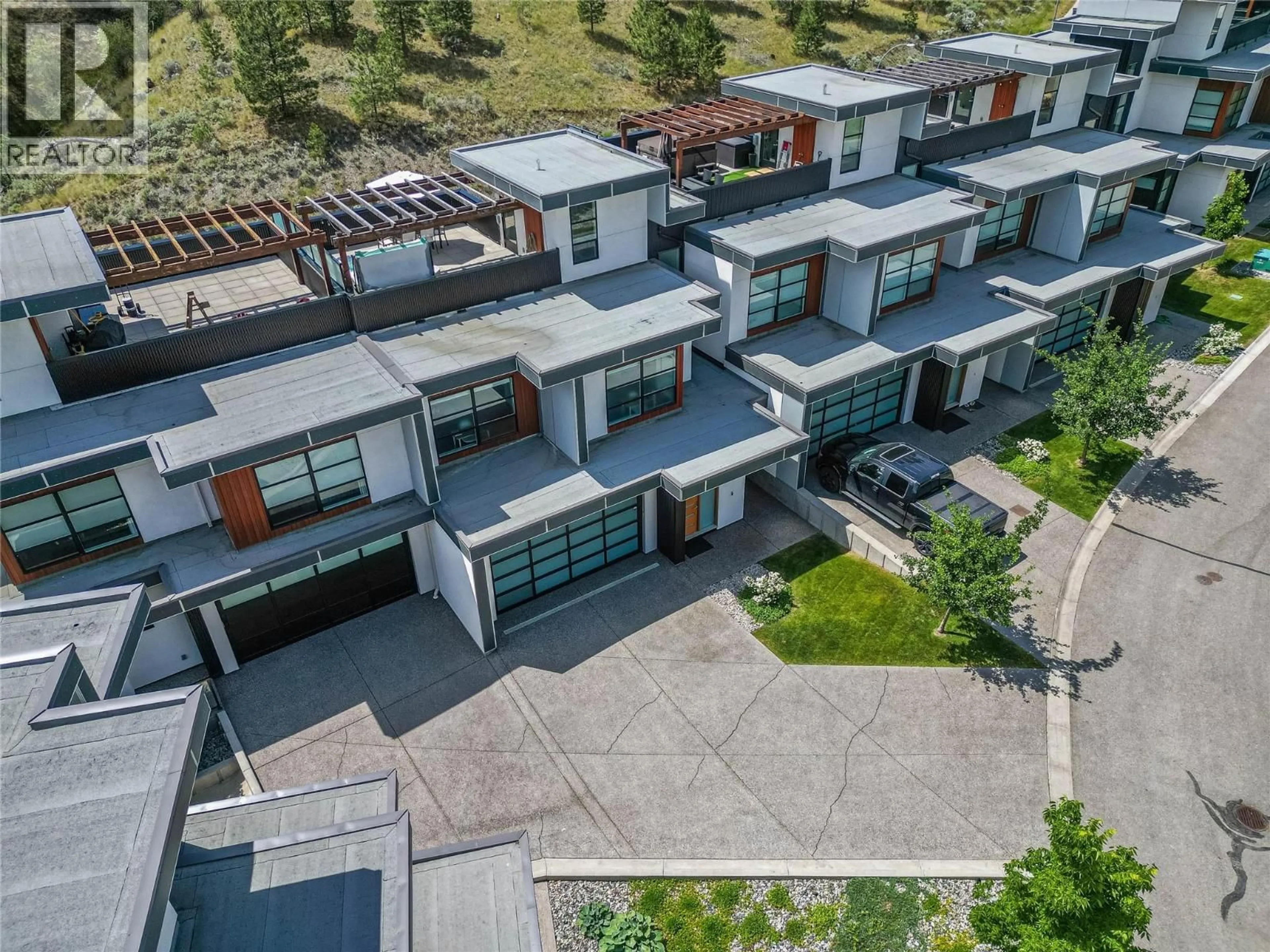 A pic from outside/outdoor area/front of a property/back of a property/a pic from drone, street for 15 - 1395 PRAIRIE ROSE DRIVE, Kamloops British Columbia V2E0B9