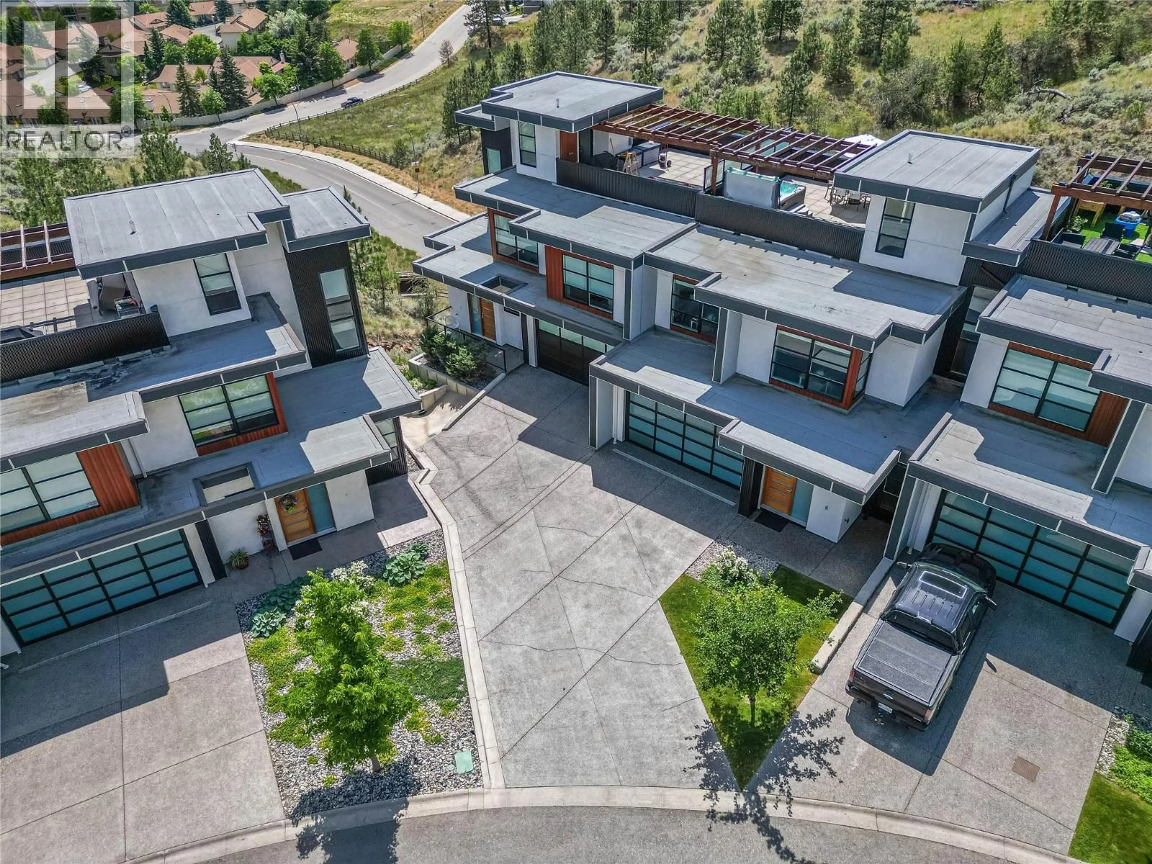 A pic from outside/outdoor area/front of a property/back of a property/a pic from drone, street for 15 - 1395 PRAIRIE ROSE DRIVE, Kamloops British Columbia V2E0B9
