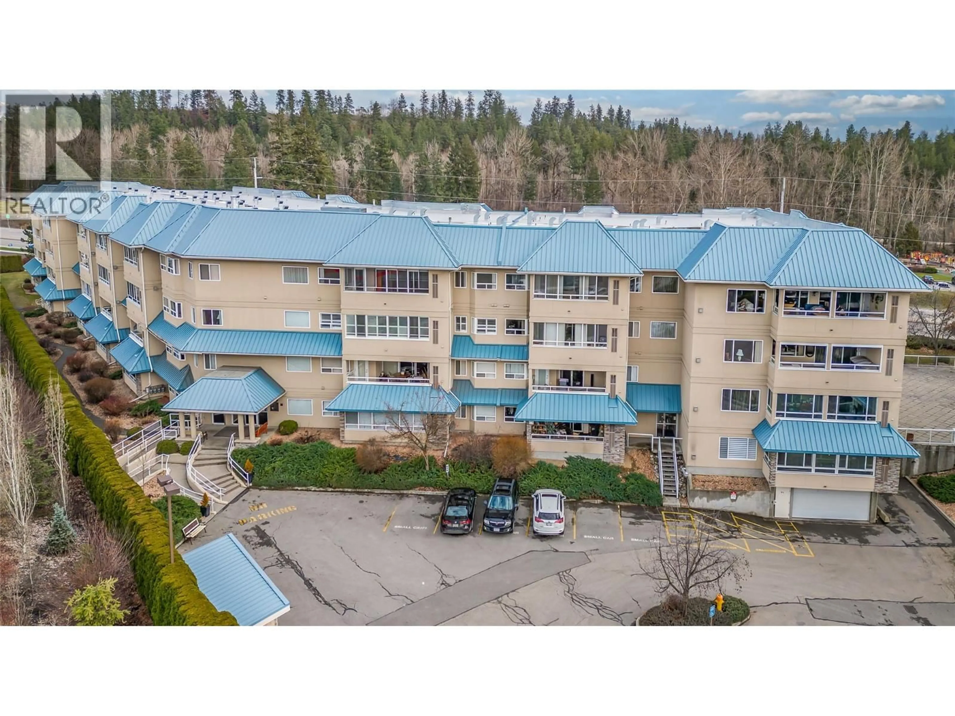 A pic from outside/outdoor area/front of a property/back of a property/a pic from drone, mountain view for 104 - 1961 DURNIN ROAD, Kelowna British Columbia V1X7Z6
