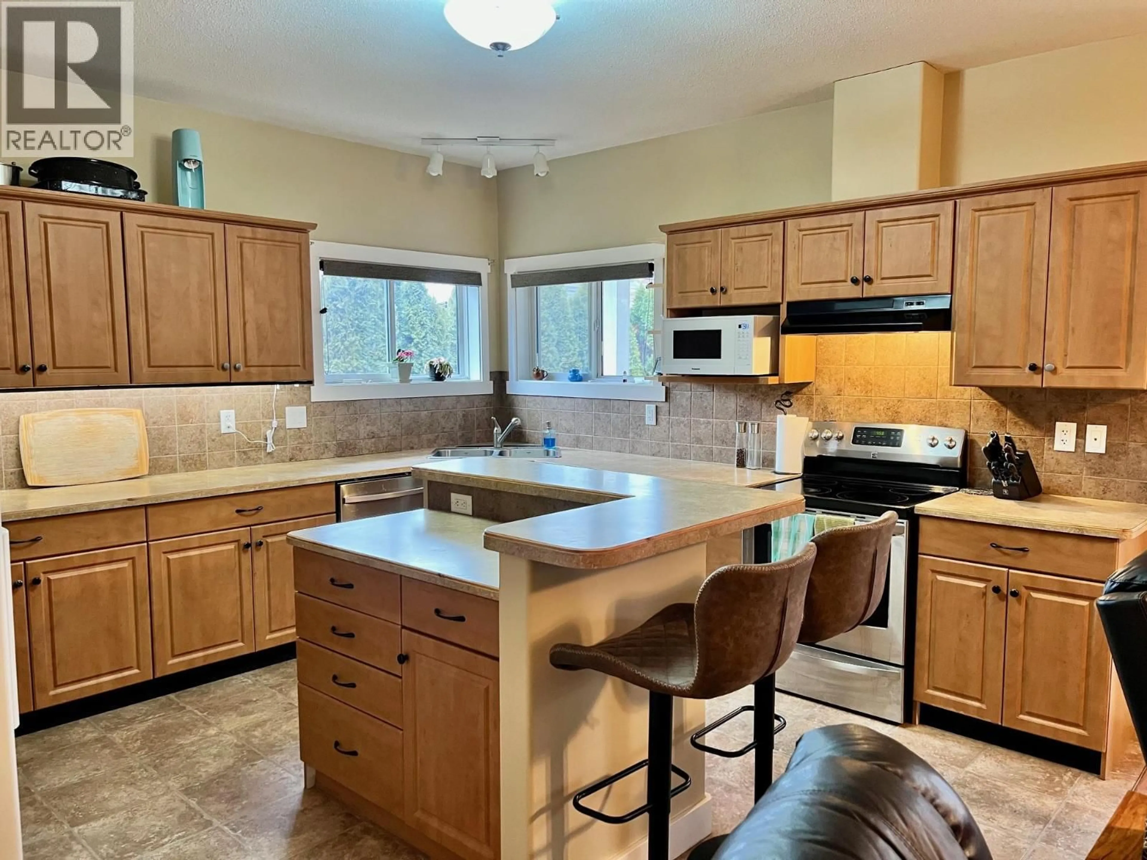 Open concept kitchen, ceramic/tile floor for 3317 ERICKSON ROAD, Erickson British Columbia V0B1G9