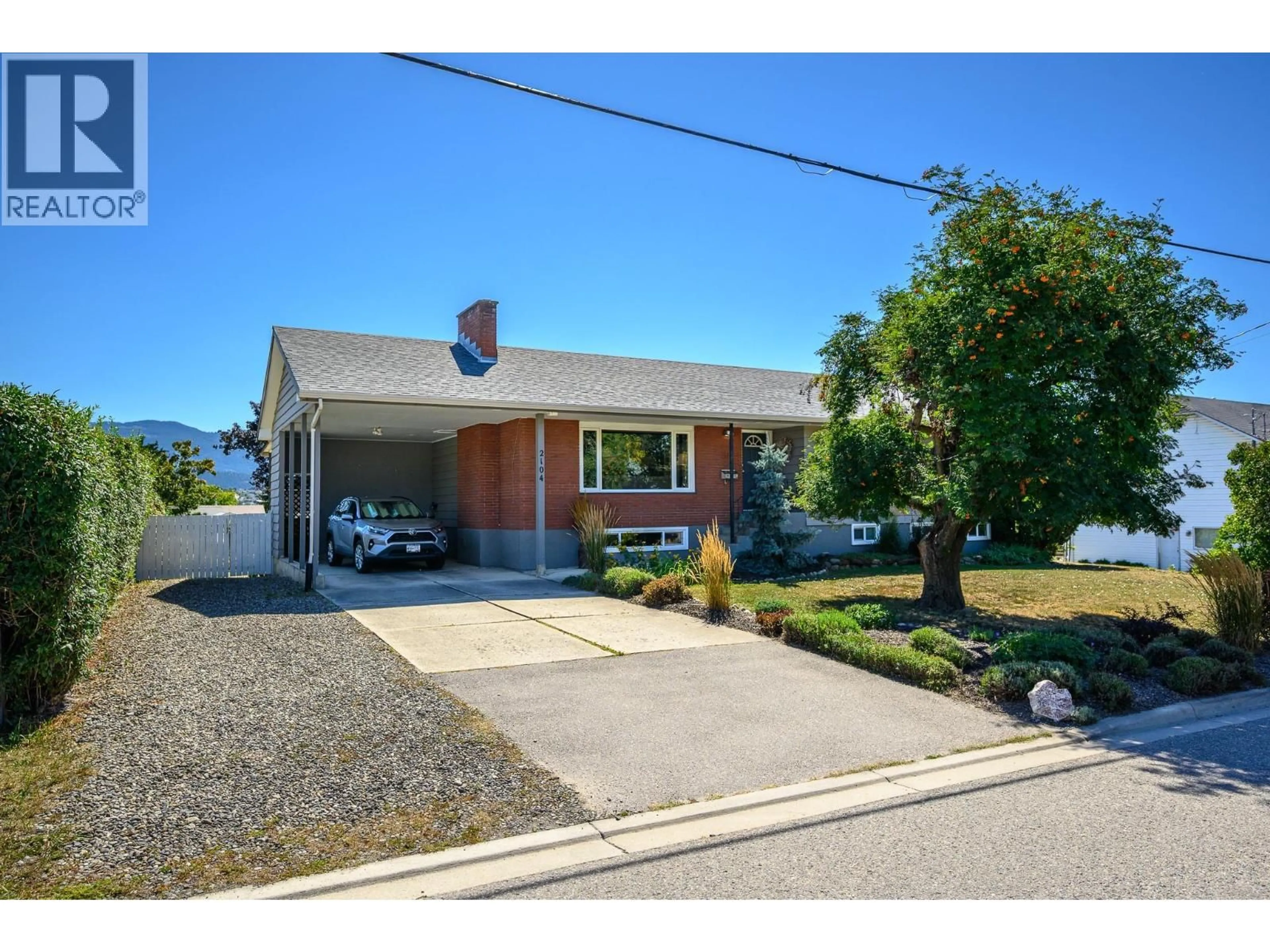 Home with brick exterior material, street for 2104 25 AVENUE, Vernon British Columbia V1T1M9