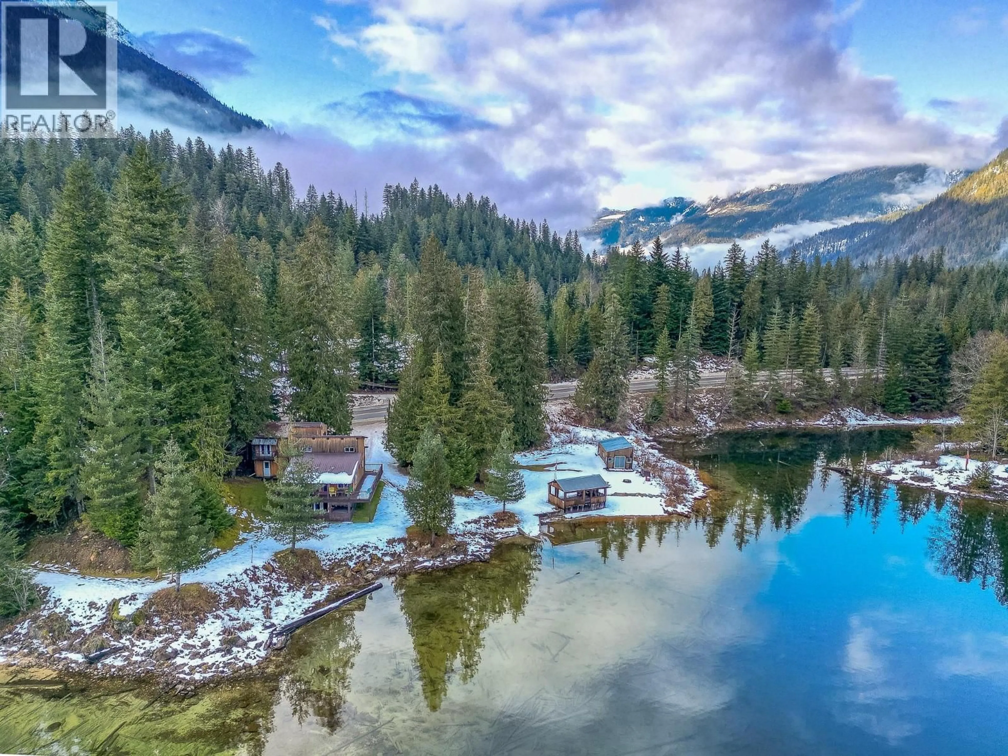 A pic from outside/outdoor area/front of a property/back of a property/a pic from drone, water/lake/river/ocean view for 8323 TRANS CANADA HIGHWAY, Revelstoke British Columbia V0E2S0