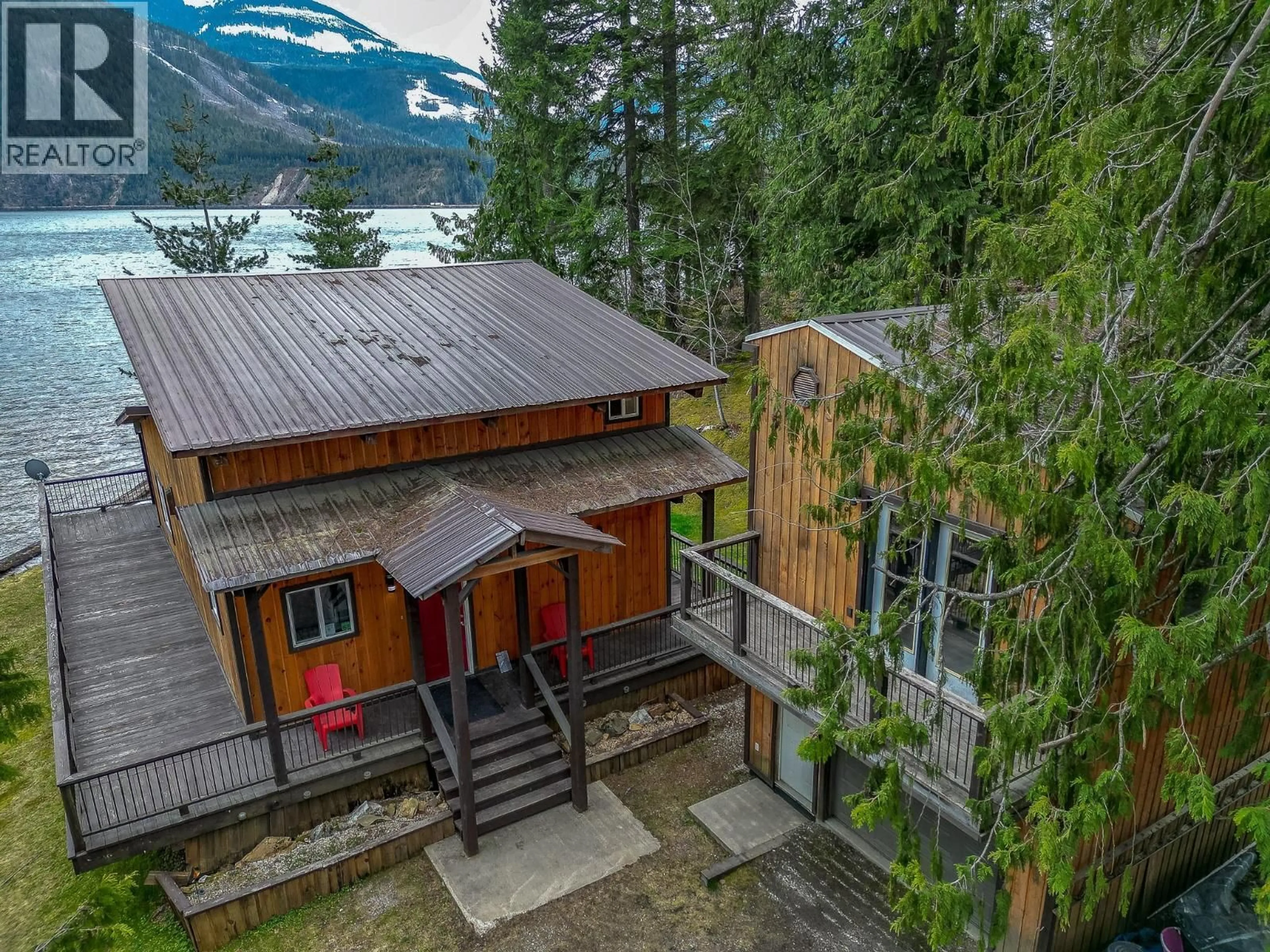 A pic from outside/outdoor area/front of a property/back of a property/a pic from drone, mountain view for 8323 TRANS CANADA HIGHWAY, Revelstoke British Columbia V0E2S0