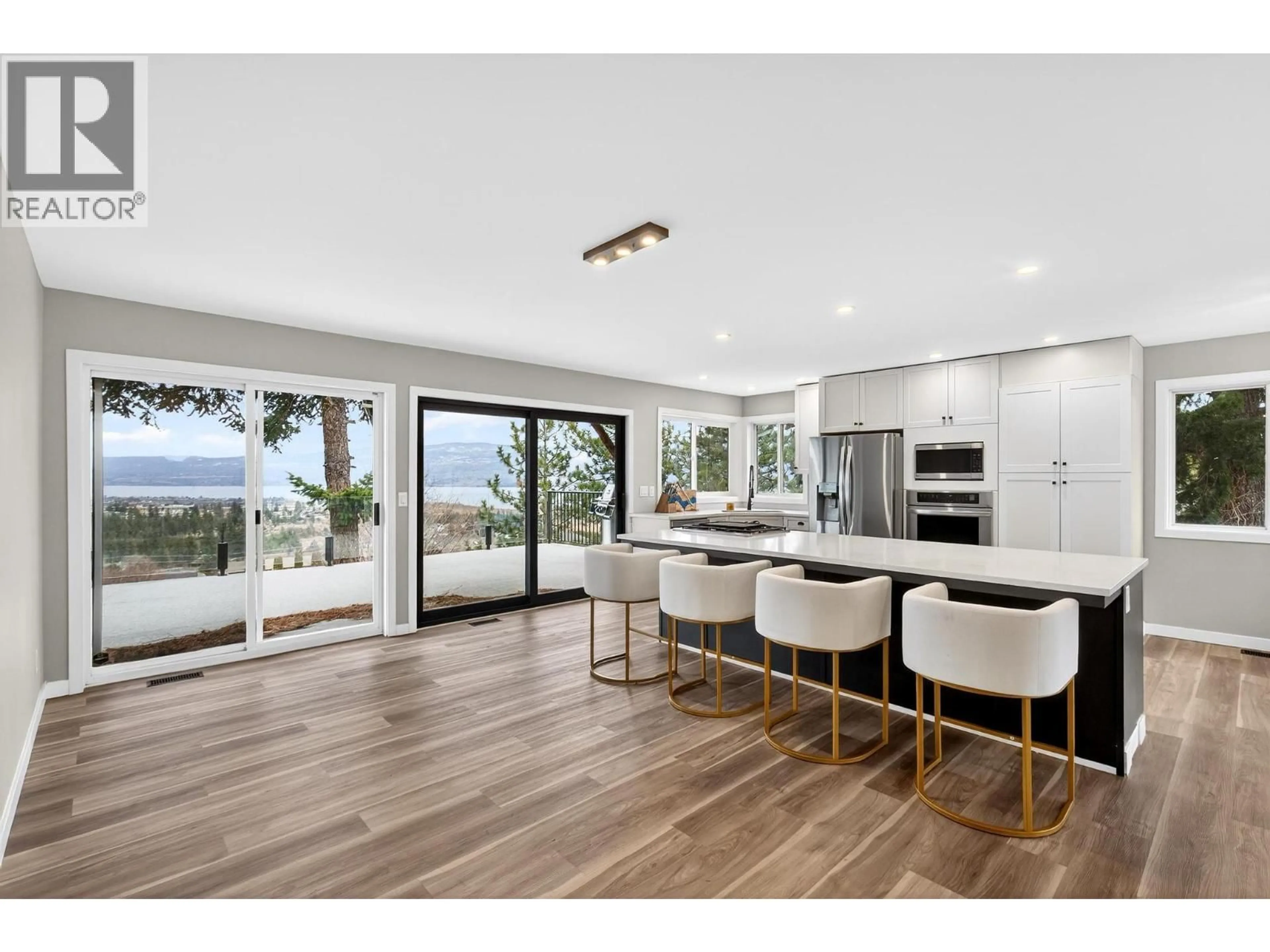 Open concept kitchen, wood/laminate floor for 2848 LOWER GLENROSA ROAD, West Kelowna British Columbia V4T1C8