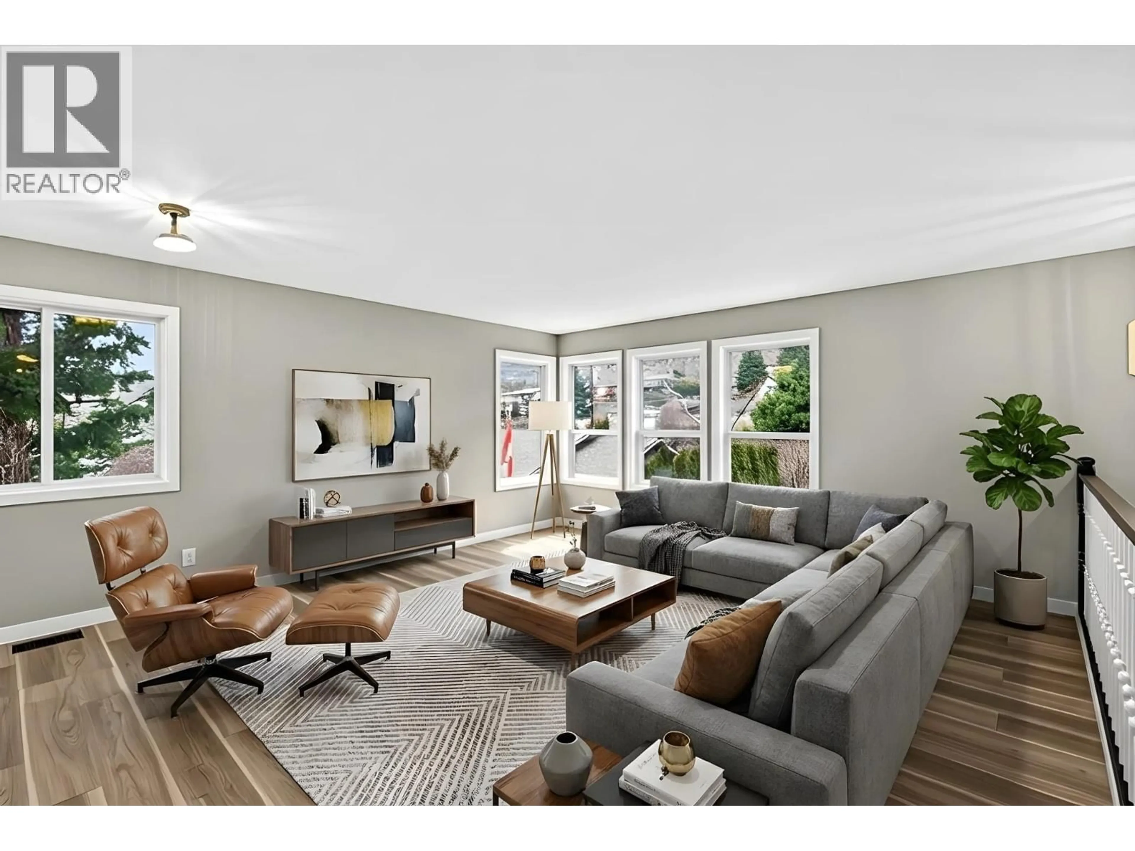 Living room with furniture, wood/laminate floor for 2848 LOWER GLENROSA ROAD, West Kelowna British Columbia V4T1C8