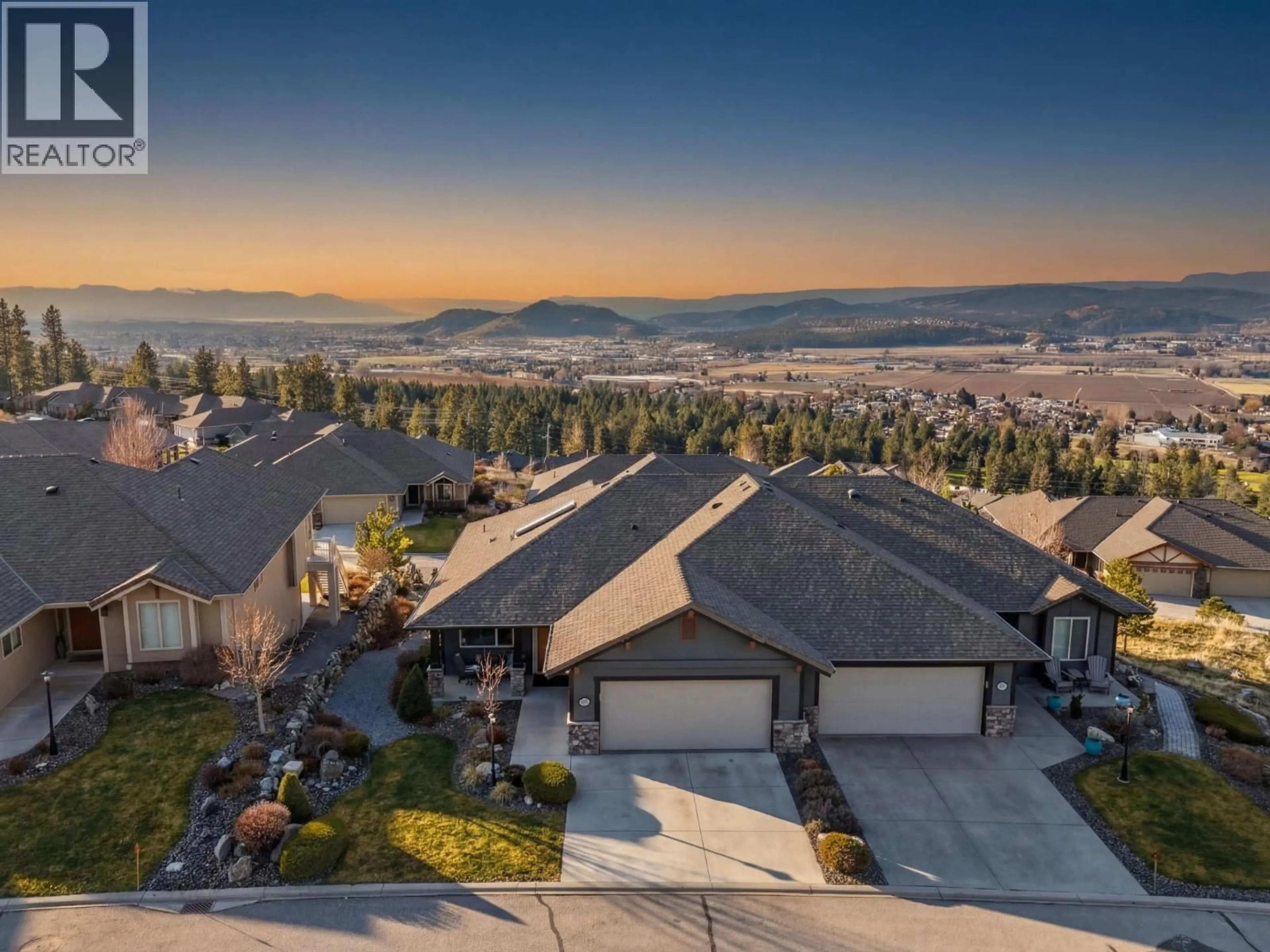 A pic from outside/outdoor area/front of a property/back of a property/a pic from drone, mountain view for 3656 RIVIERA DRIVE, Kelowna British Columbia V1X8E4