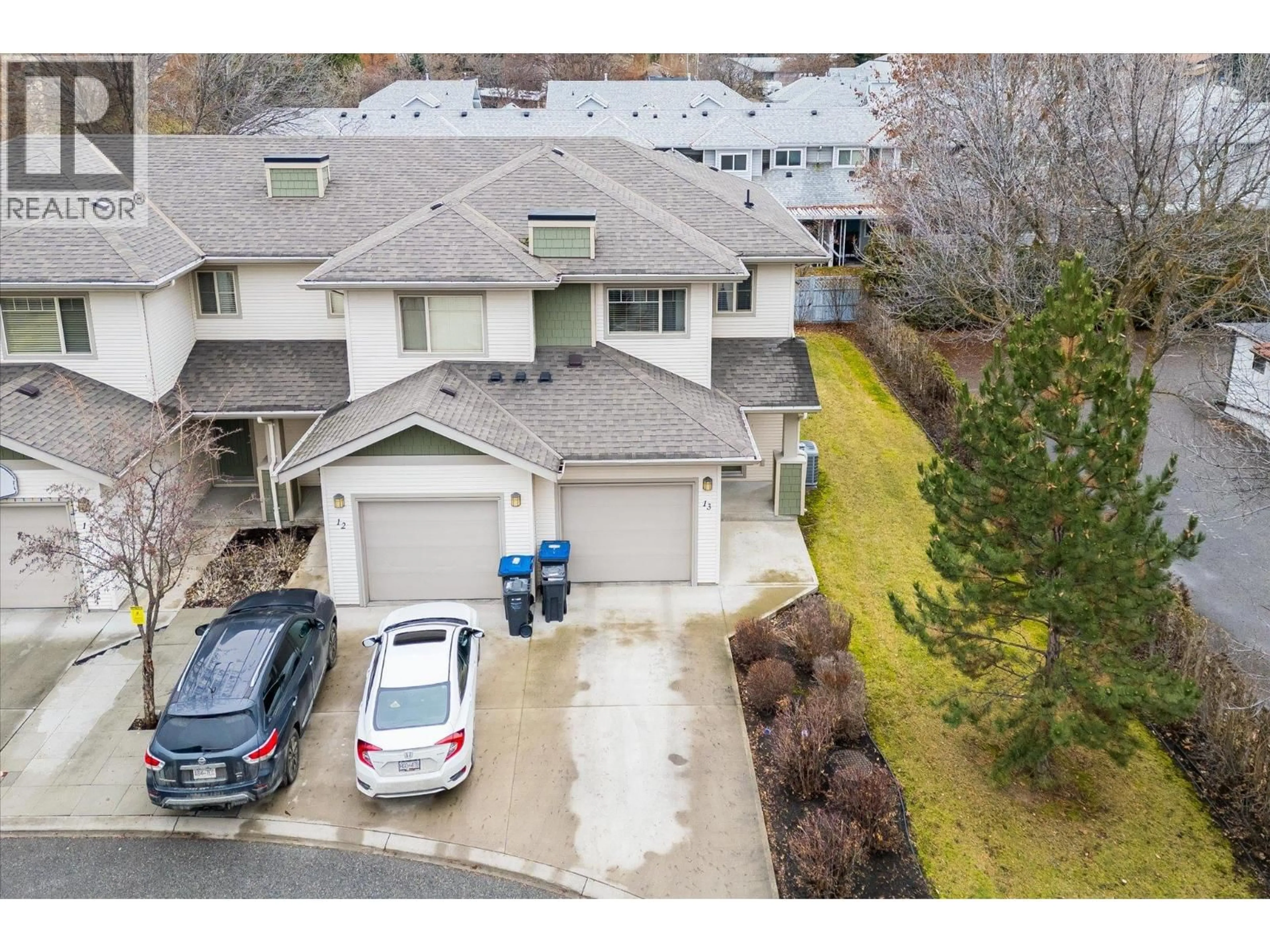 A pic from outside/outdoor area/front of a property/back of a property/a pic from drone, street for 13 - 335 GERSTMAR ROAD, Kelowna British Columbia V1X4A6