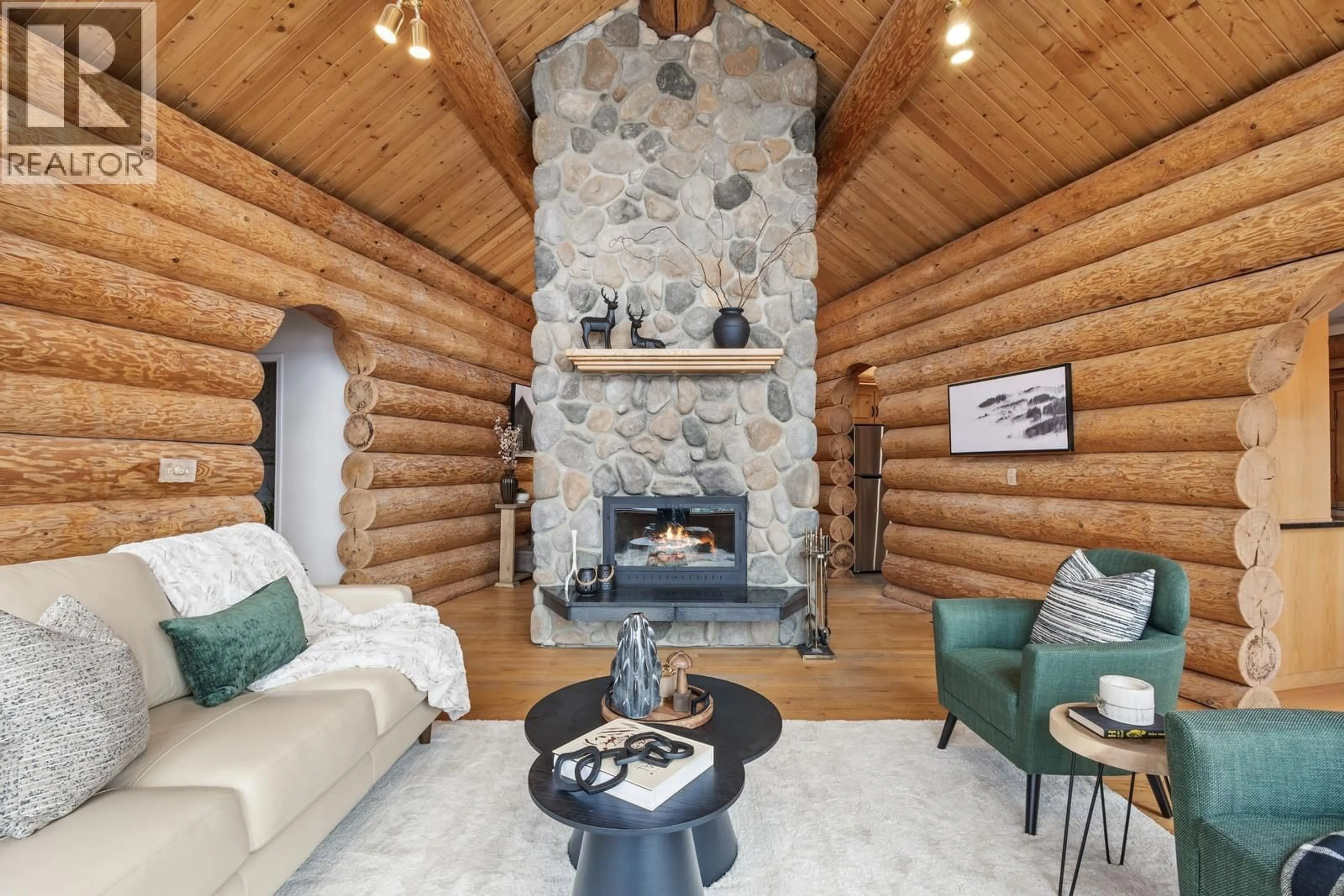 Living room with furniture, wood/laminate floor for 13574 MOBERLY ROAD, Lake Country British Columbia V4V1A2