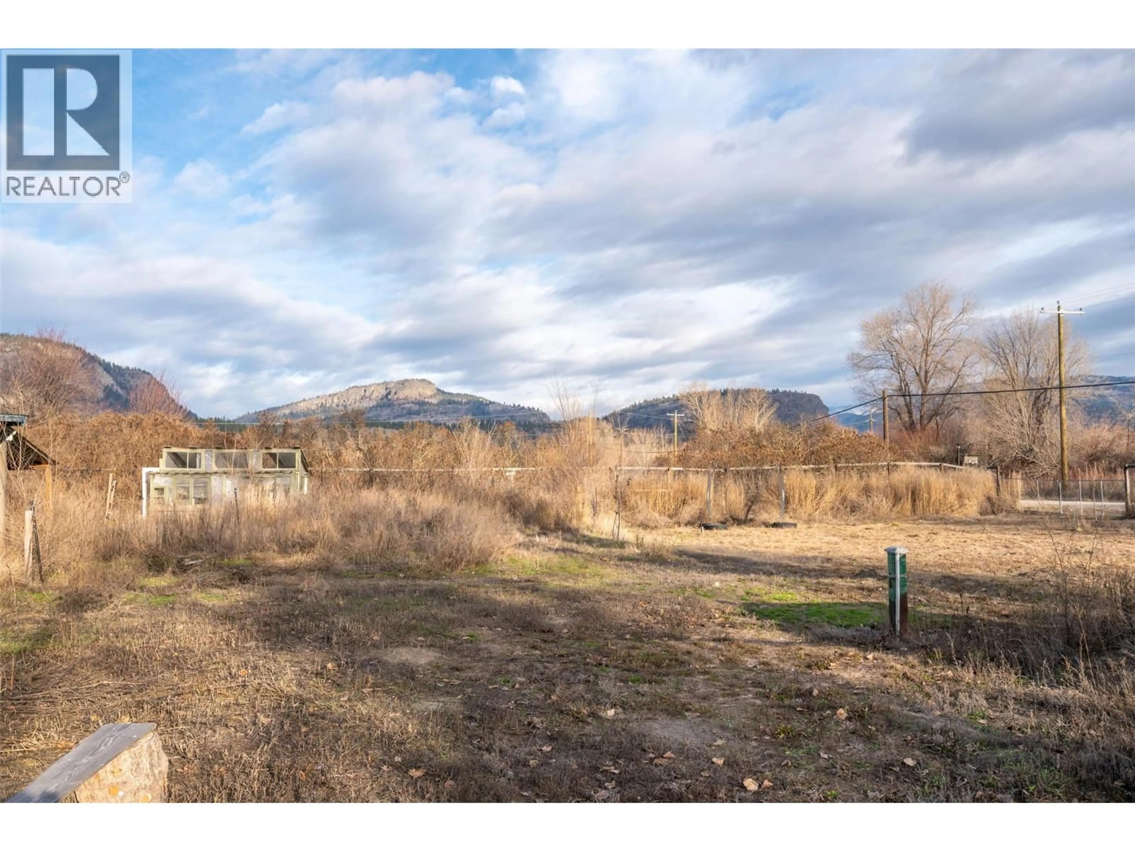 A pic from outside/outdoor area/front of a property/back of a property/a pic from drone, mountain view for 7466 ISLAND ROAD, Oliver British Columbia V0H1T7