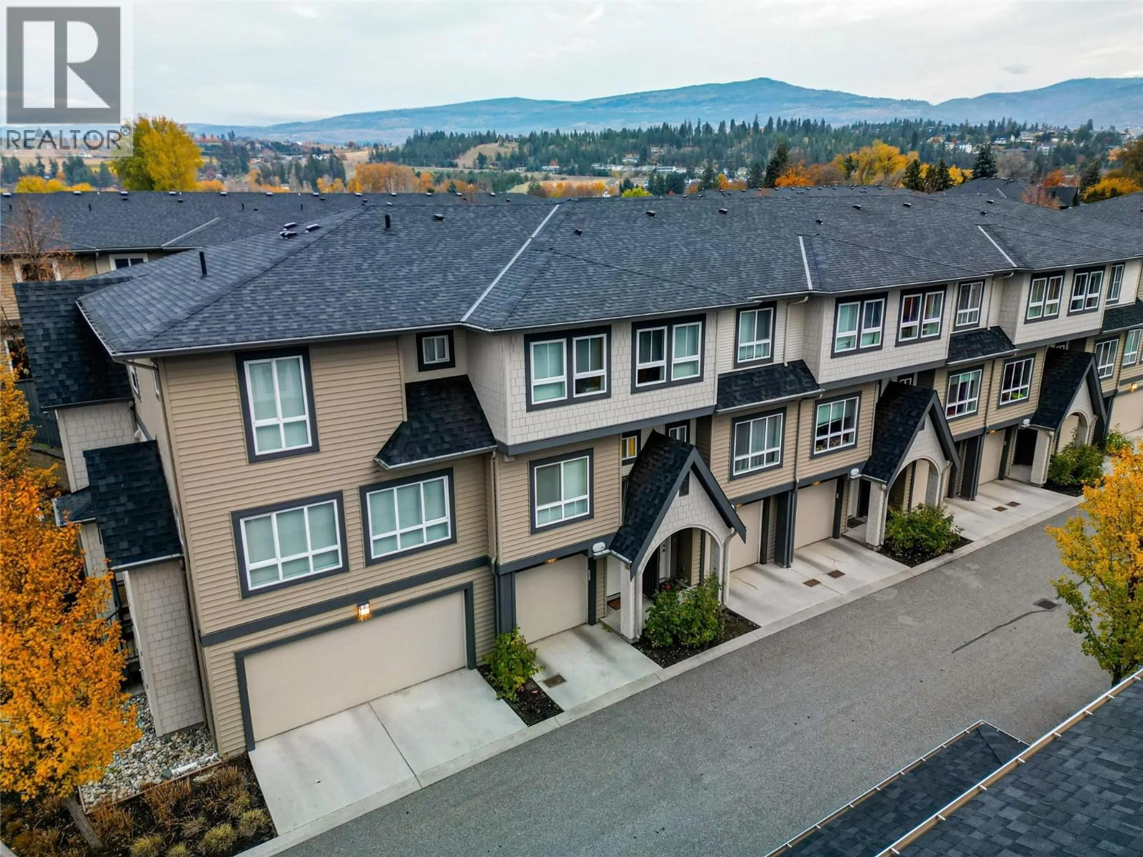 A pic from outside/outdoor area/front of a property/back of a property/a pic from drone, mountain view for 69 - 680 OLD MEADOWS ROAD, Kelowna British Columbia V1W5L4