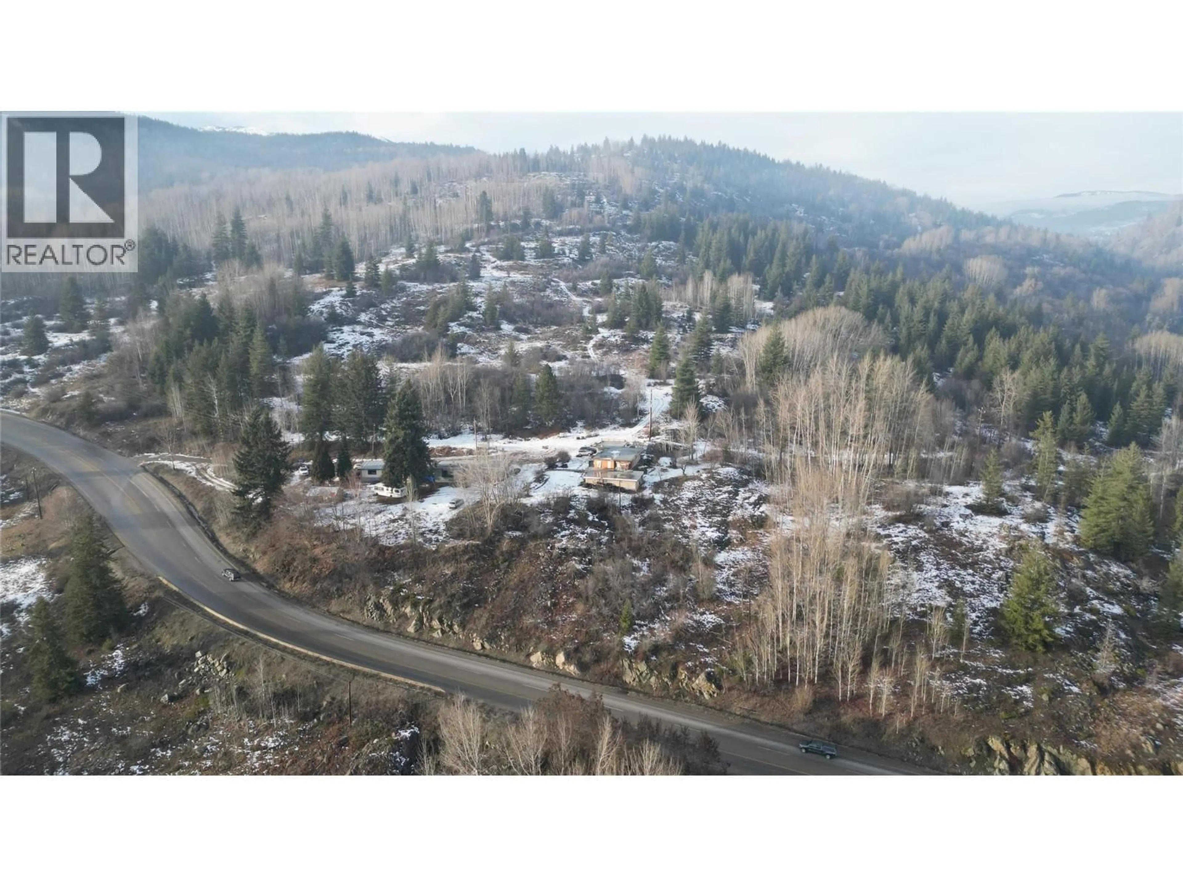 A pic from outside/outdoor area/front of a property/back of a property/a pic from drone, mountain view for 1383 3B HIGHWAY, Warfield British Columbia V1R4L3