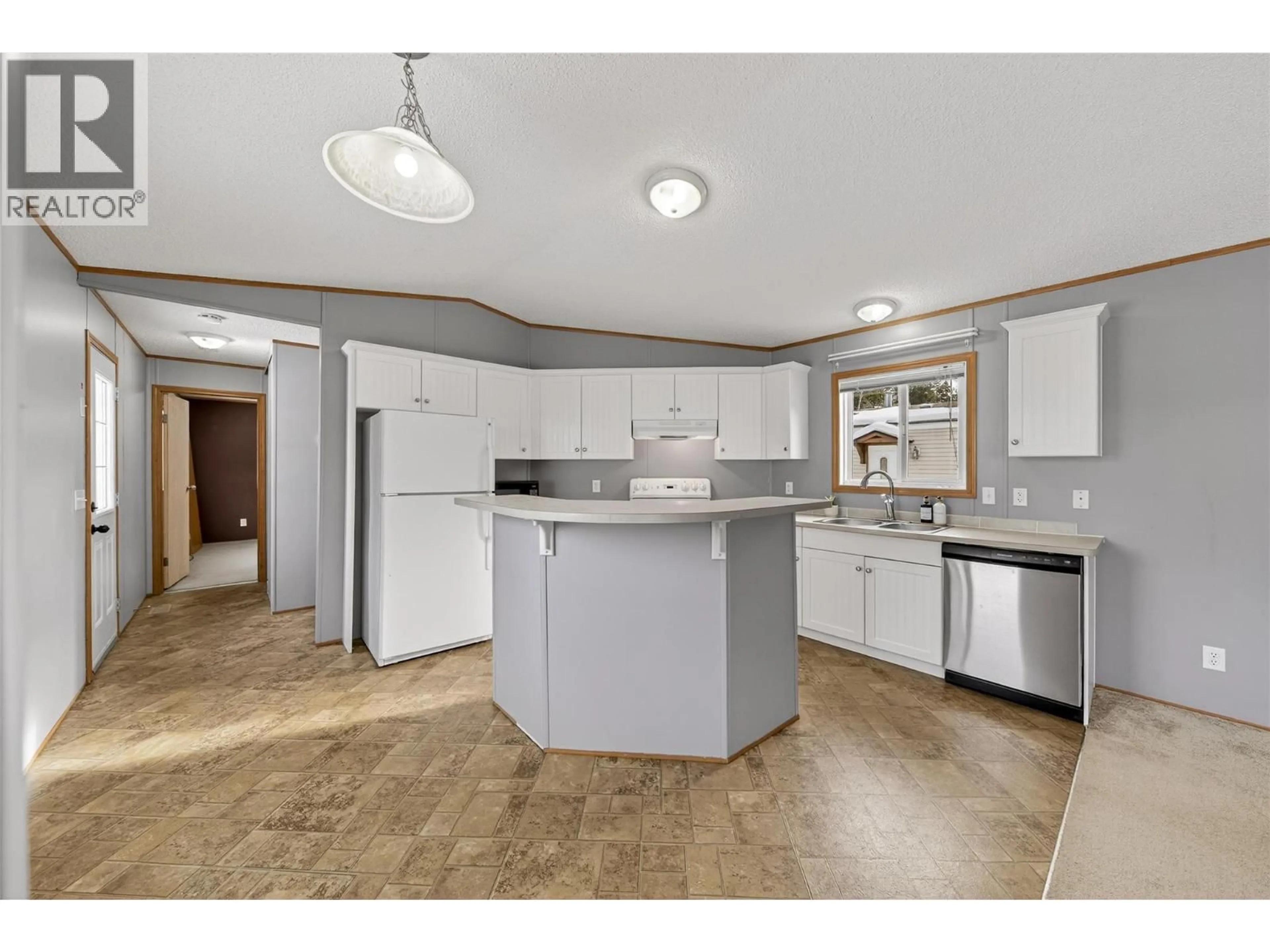 Open concept kitchen, ceramic/tile floor for 1232 SYCAMORE ROAD, Sparwood British Columbia V0B2G2