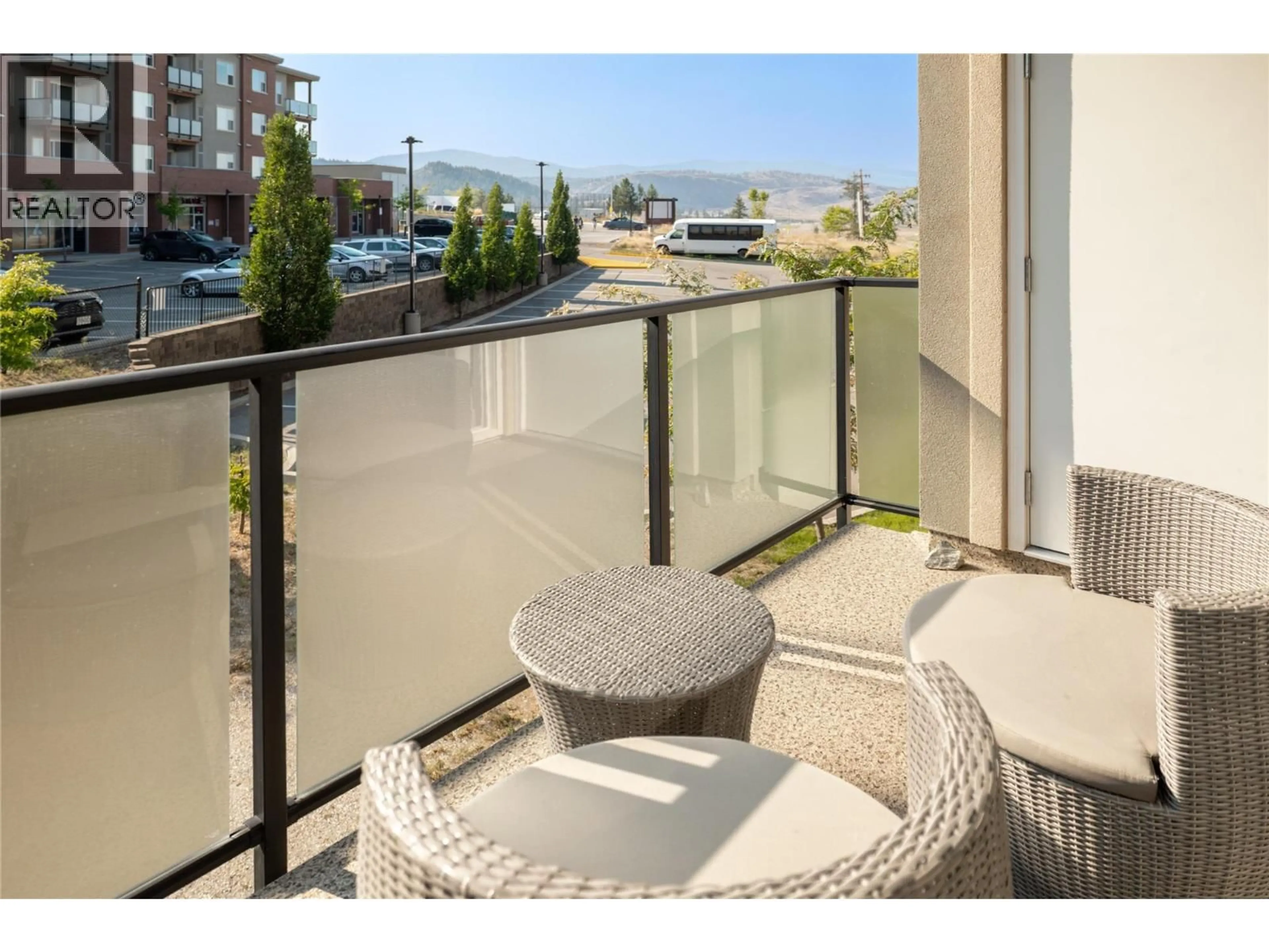Balcony in the apartment, water/lake/river/ocean view for 208 - 985 ACADEMY WAY, Kelowna British Columbia V1V3C8