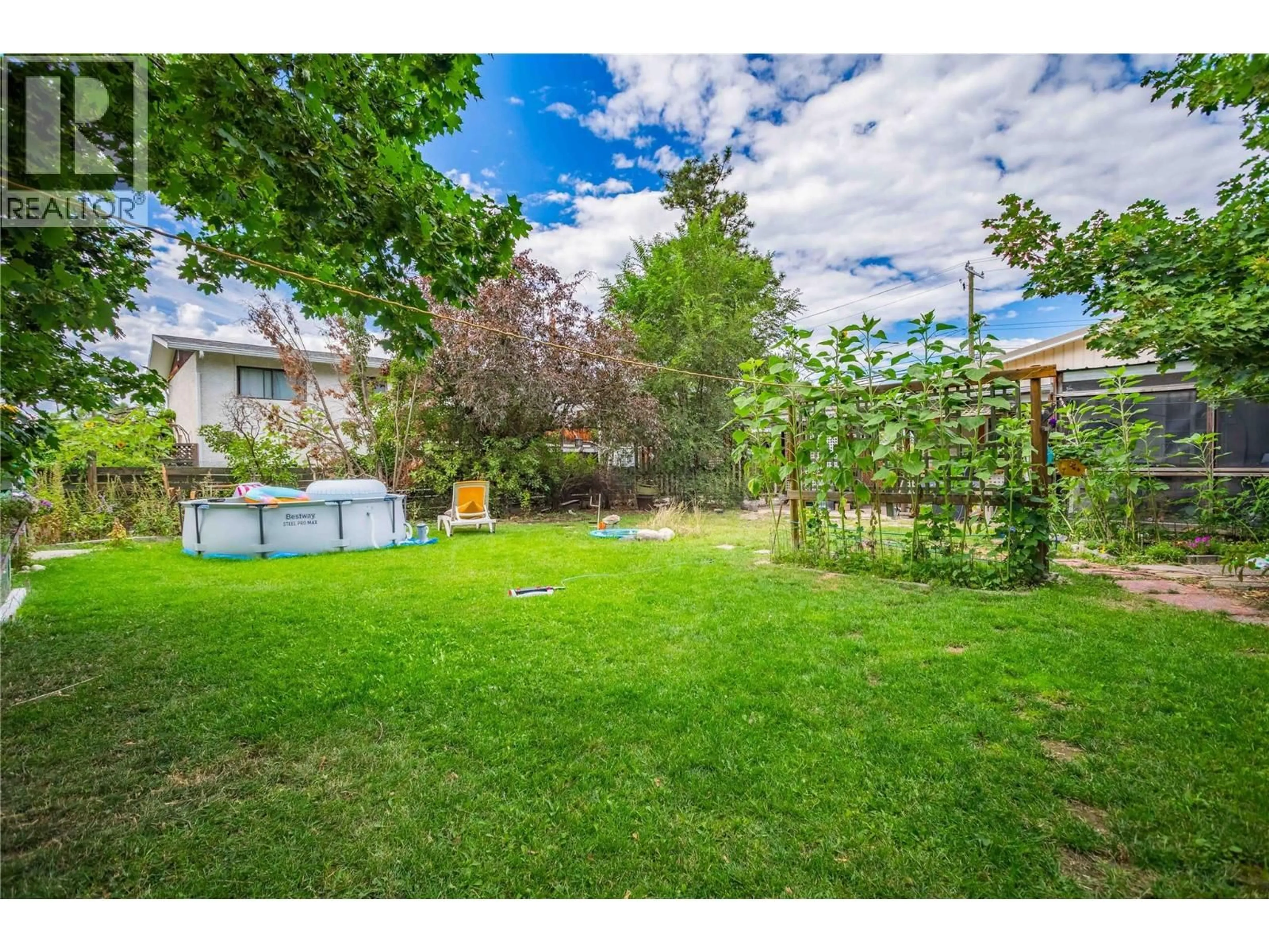 A pic from outside/outdoor area/front of a property/back of a property/a pic from drone, street for 425 LEATHEAD ROAD, Kelowna British Columbia V1X2J3