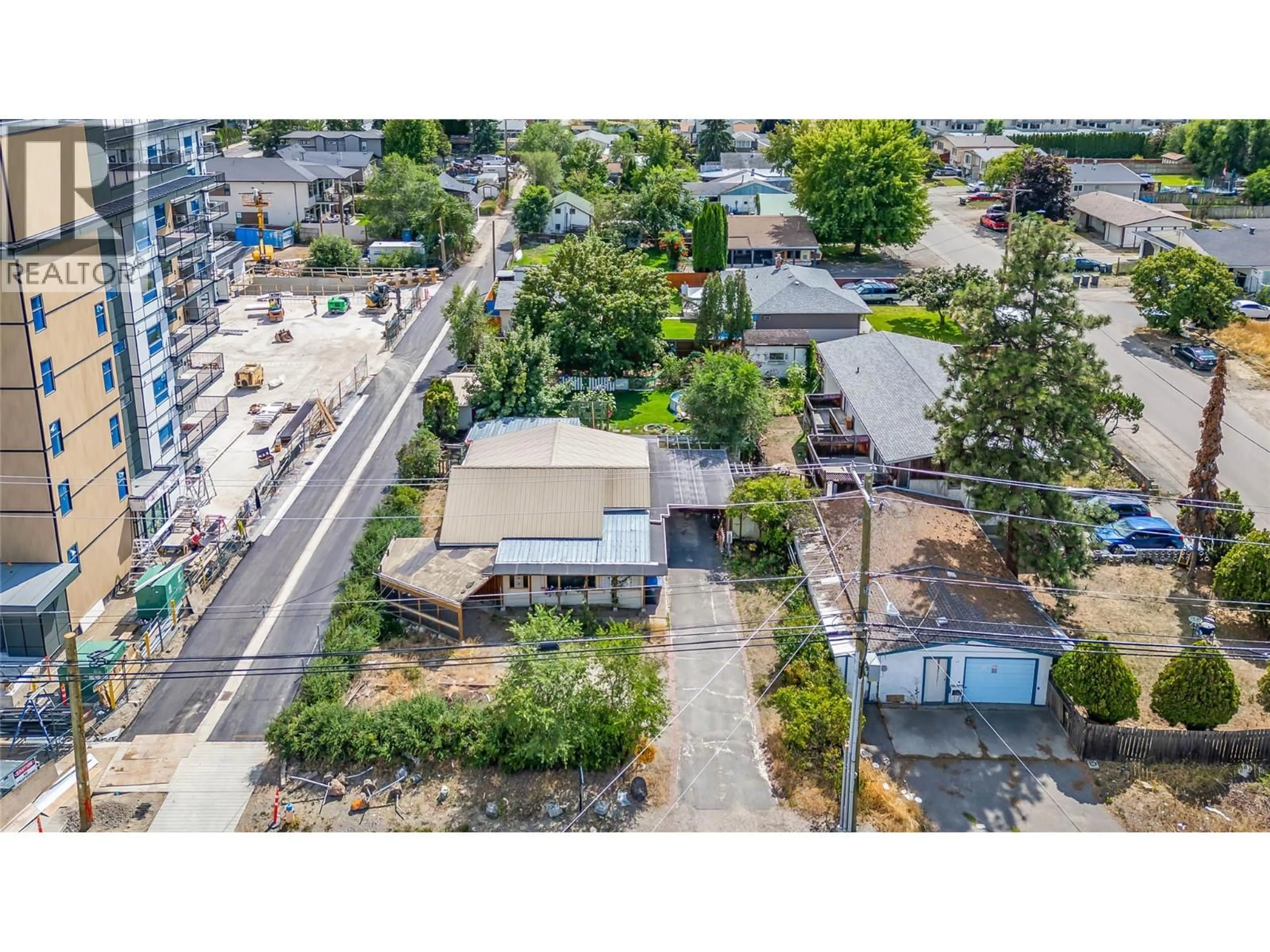 A pic from outside/outdoor area/front of a property/back of a property/a pic from drone, street for 425 LEATHEAD ROAD, Kelowna British Columbia V1X2J3