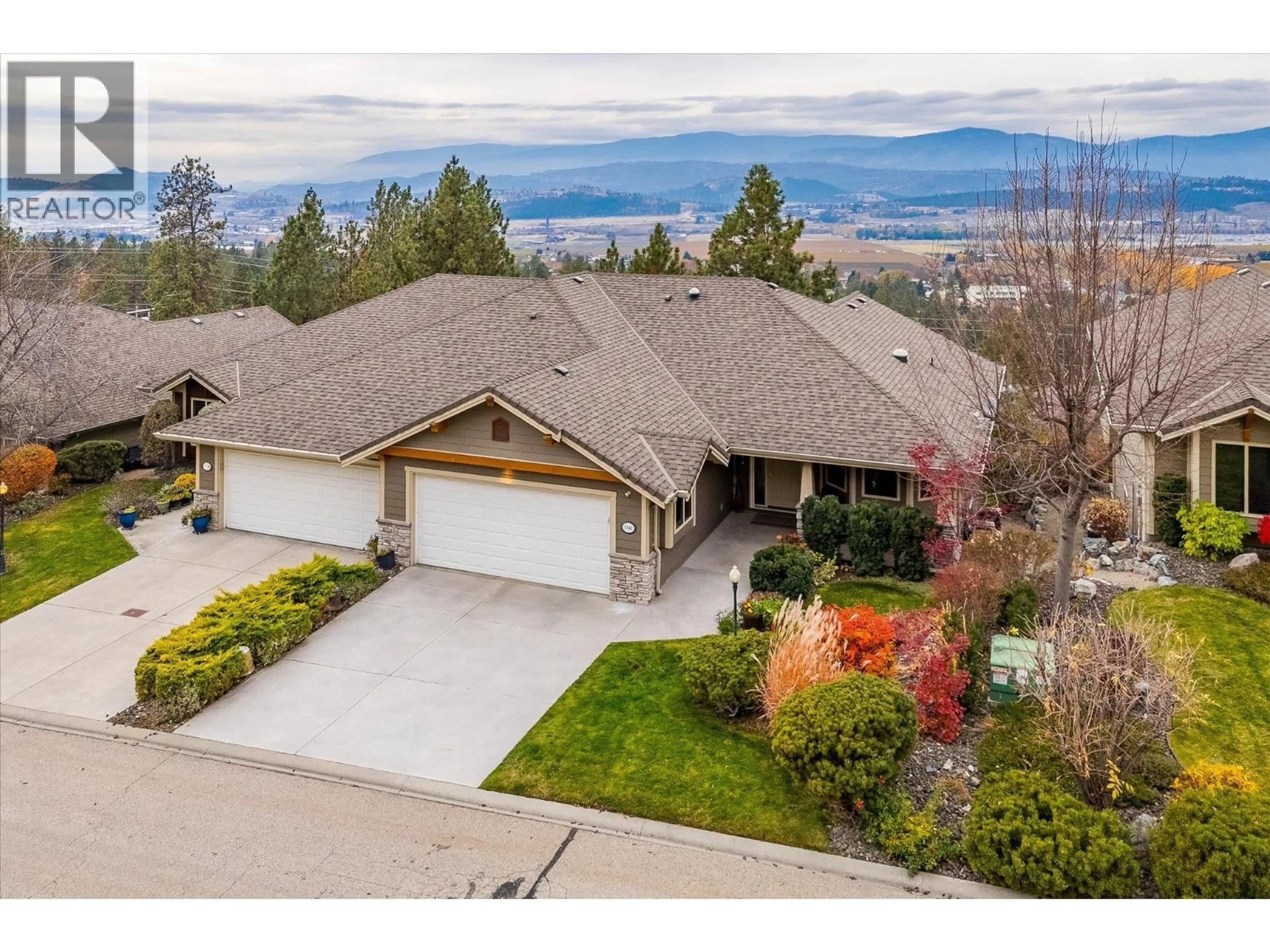A pic from outside/outdoor area/front of a property/back of a property/a pic from drone, mountain view for 5342 TRICKLE CREEK DRIVE, Kelowna British Columbia V1X8C7