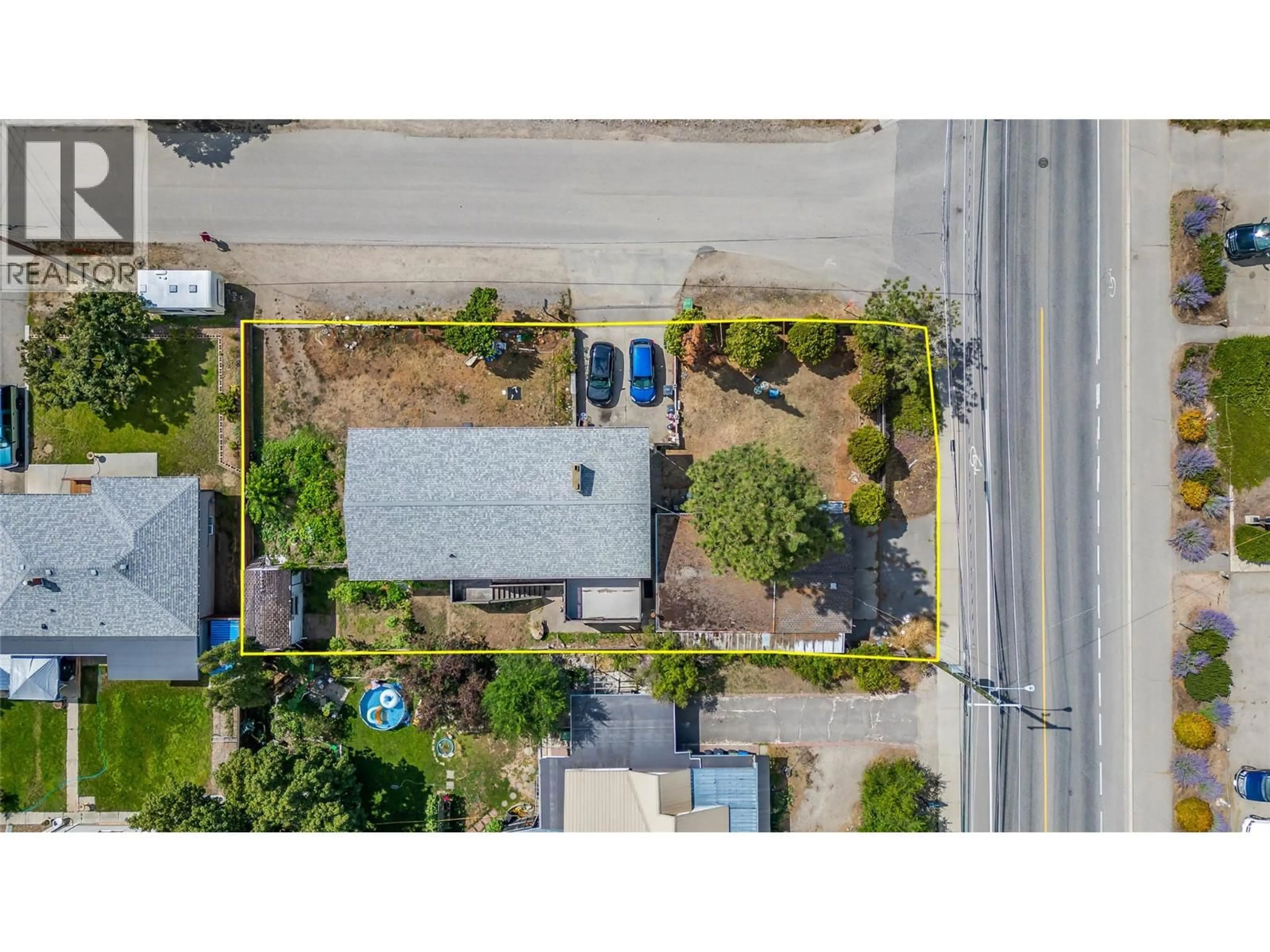 A pic from outside/outdoor area/front of a property/back of a property/a pic from drone, street for 545 FROELICH ROAD, Kelowna British Columbia V1X3M7
