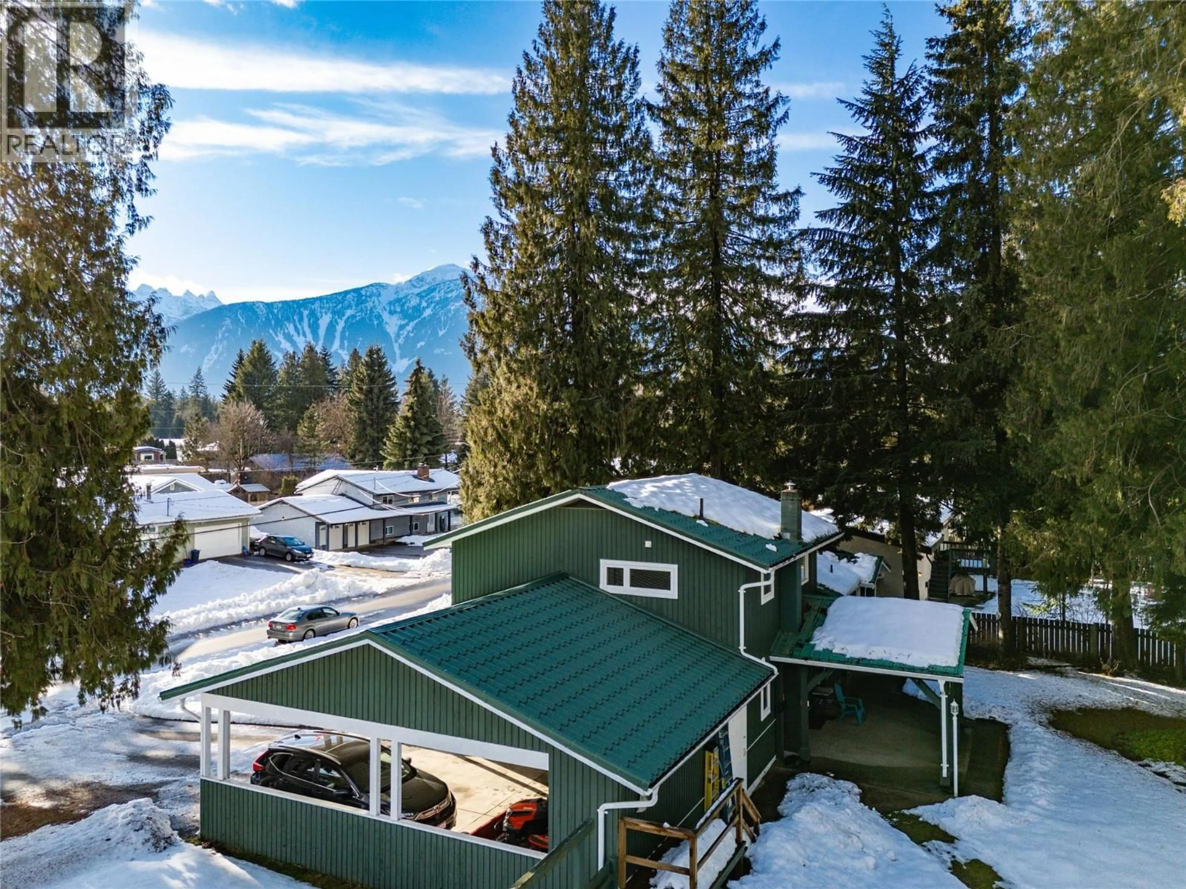 A pic from outside/outdoor area/front of a property/back of a property/a pic from drone, mountain view for 1674 DOGWOOD DRIVE, Revelstoke British Columbia V0E2S1