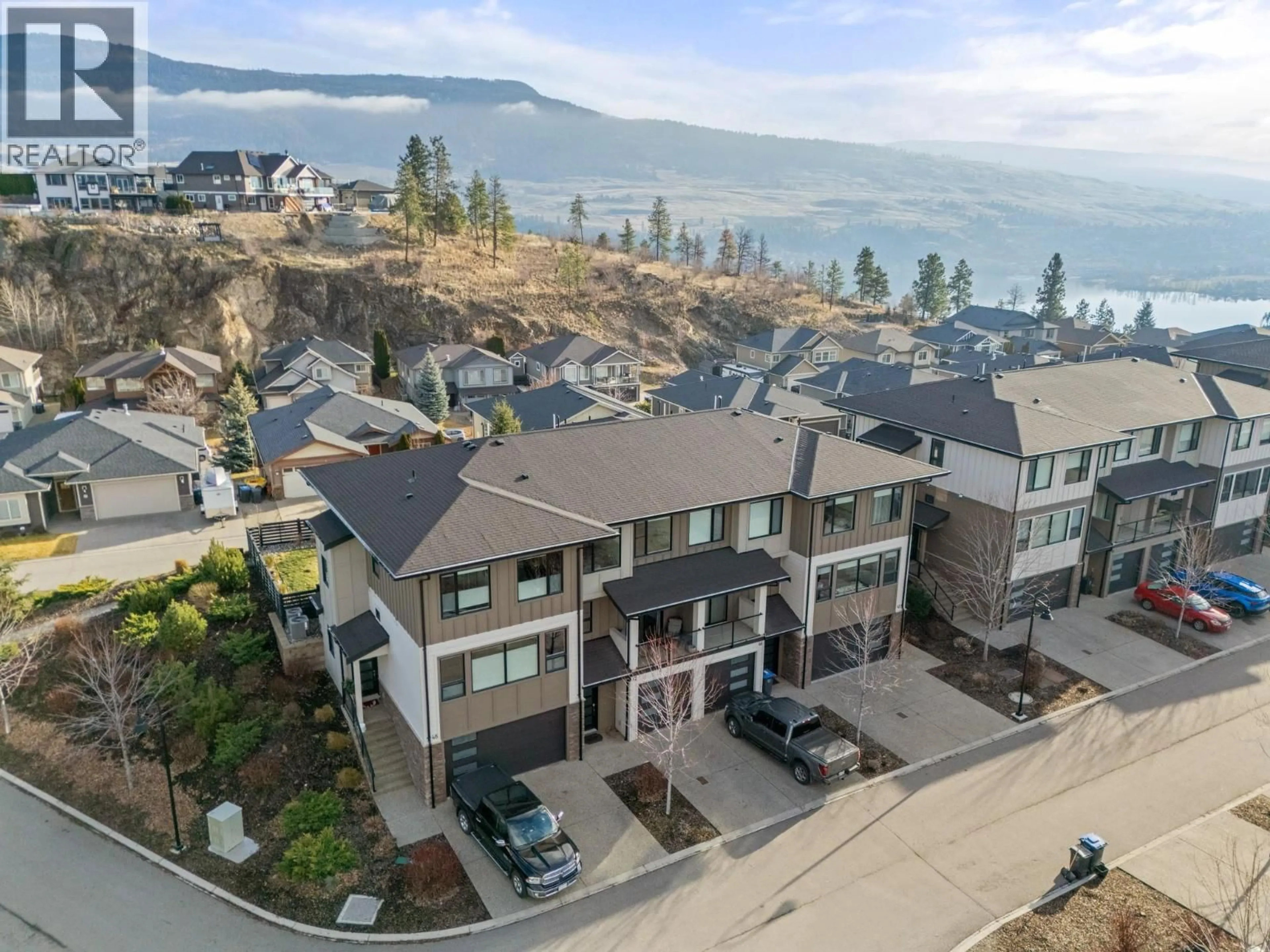 A pic from outside/outdoor area/front of a property/back of a property/a pic from drone, water/lake/river/ocean view for 47 - 12798 LAKE HILL DRIVE, Lake Country British Columbia V4V2W5