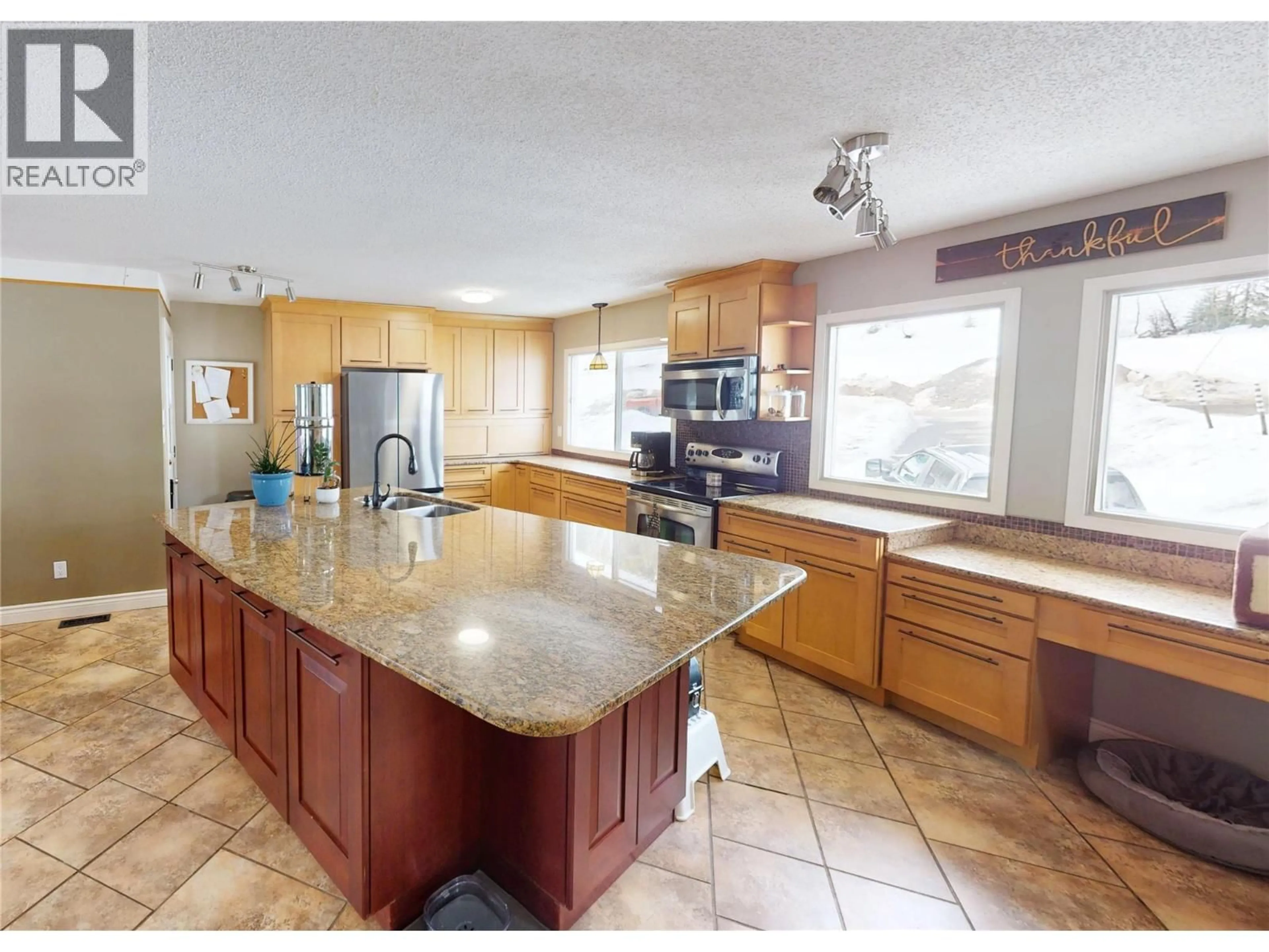 Open concept kitchen, ceramic/tile floor for 1110 ASH CRESCENT, Elkford British Columbia V0B1H0