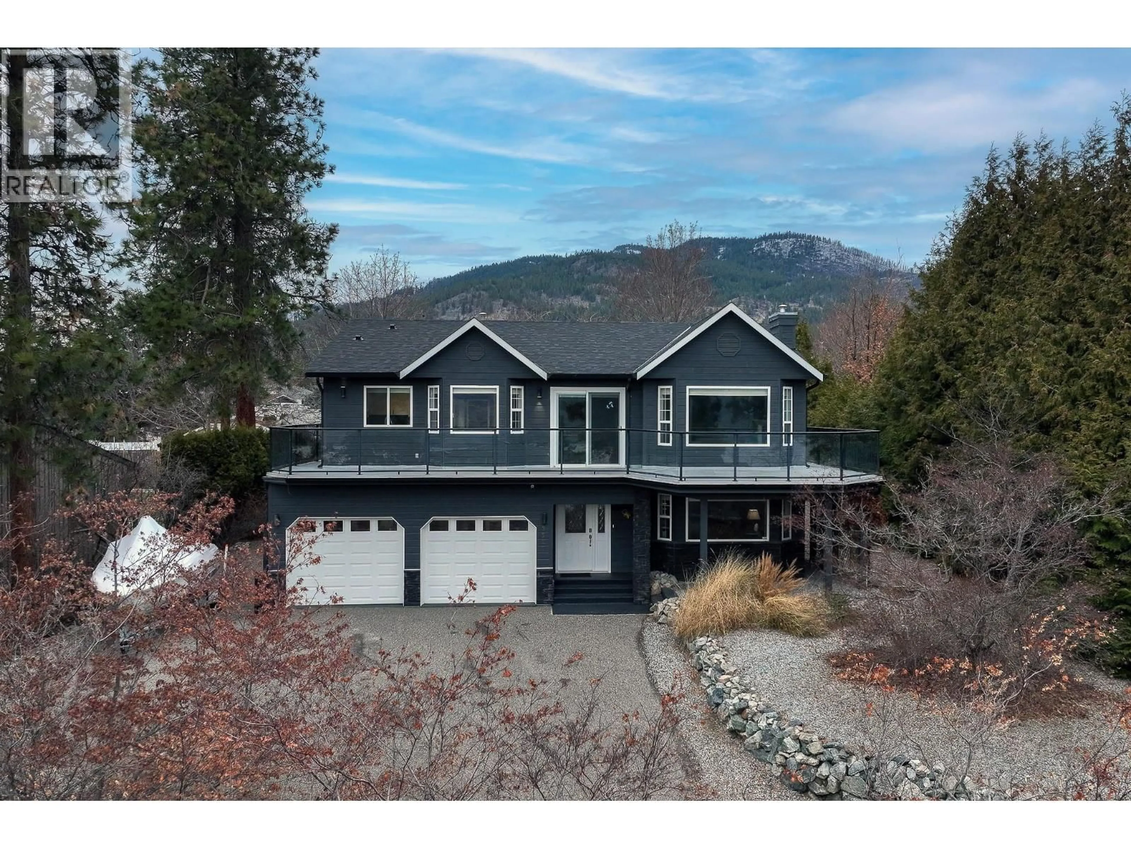 A pic from outside/outdoor area/front of a property/back of a property/a pic from drone, water/lake/river/ocean view for 3920 TREPANIER HEIGHTS AVENUE, Peachland British Columbia V0H1X0