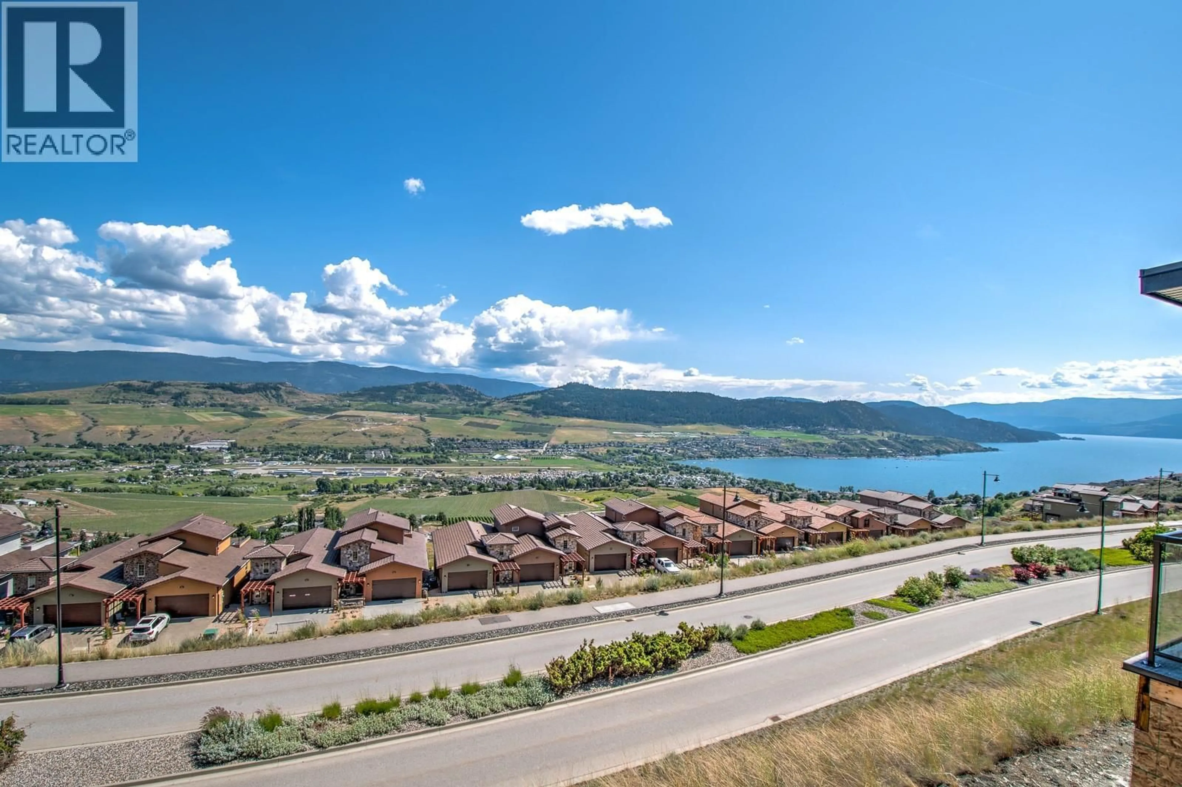 A pic from outside/outdoor area/front of a property/back of a property/a pic from drone, water/lake/river/ocean view for 20 - 7735 OKANAGAN HILLS BOULEVARD, Vernon British Columbia V1H0A7