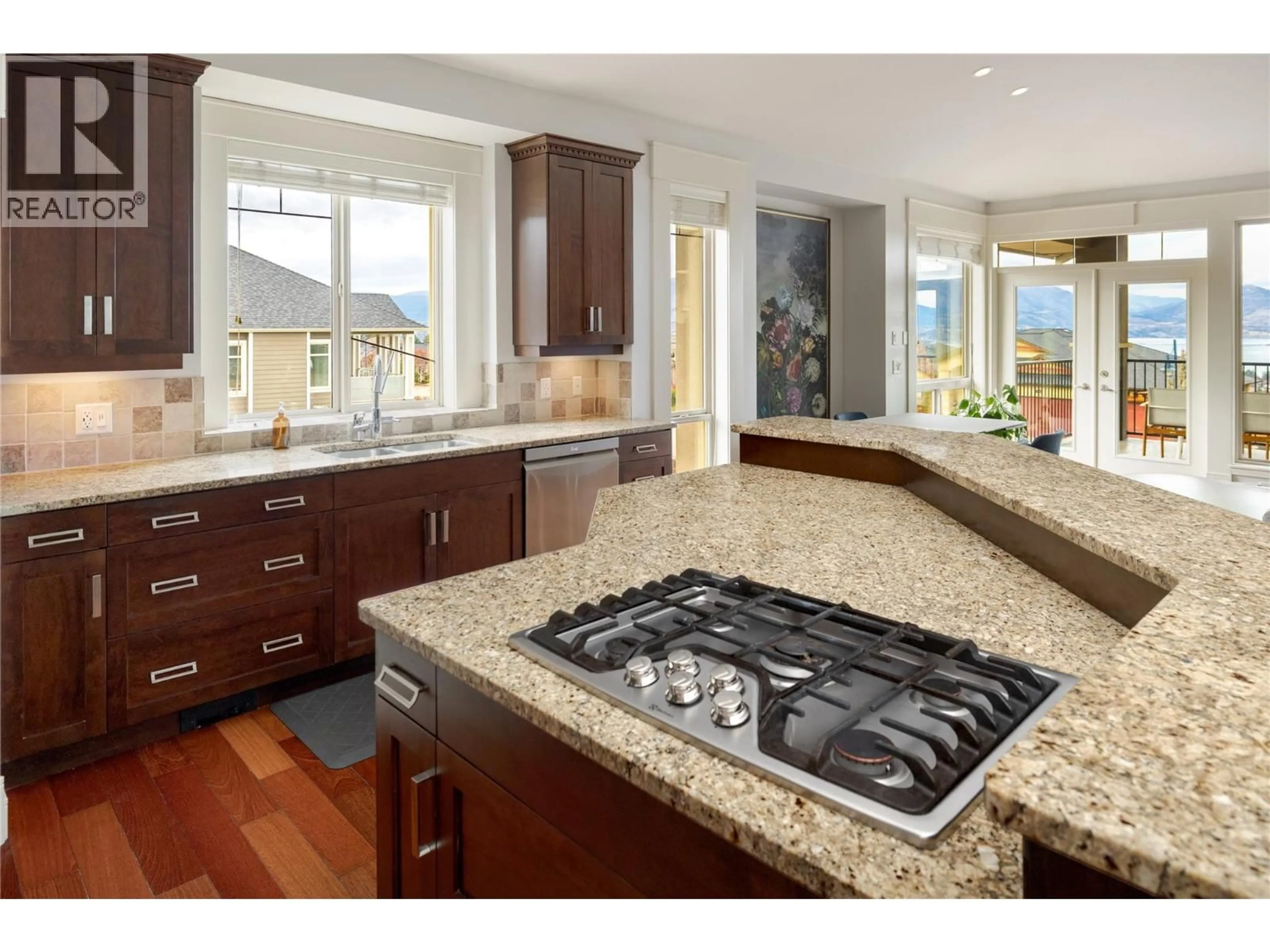 Open concept kitchen, ceramic/tile floor for 667 DEVONIAN AVENUE, Kelowna British Columbia V1W5C2