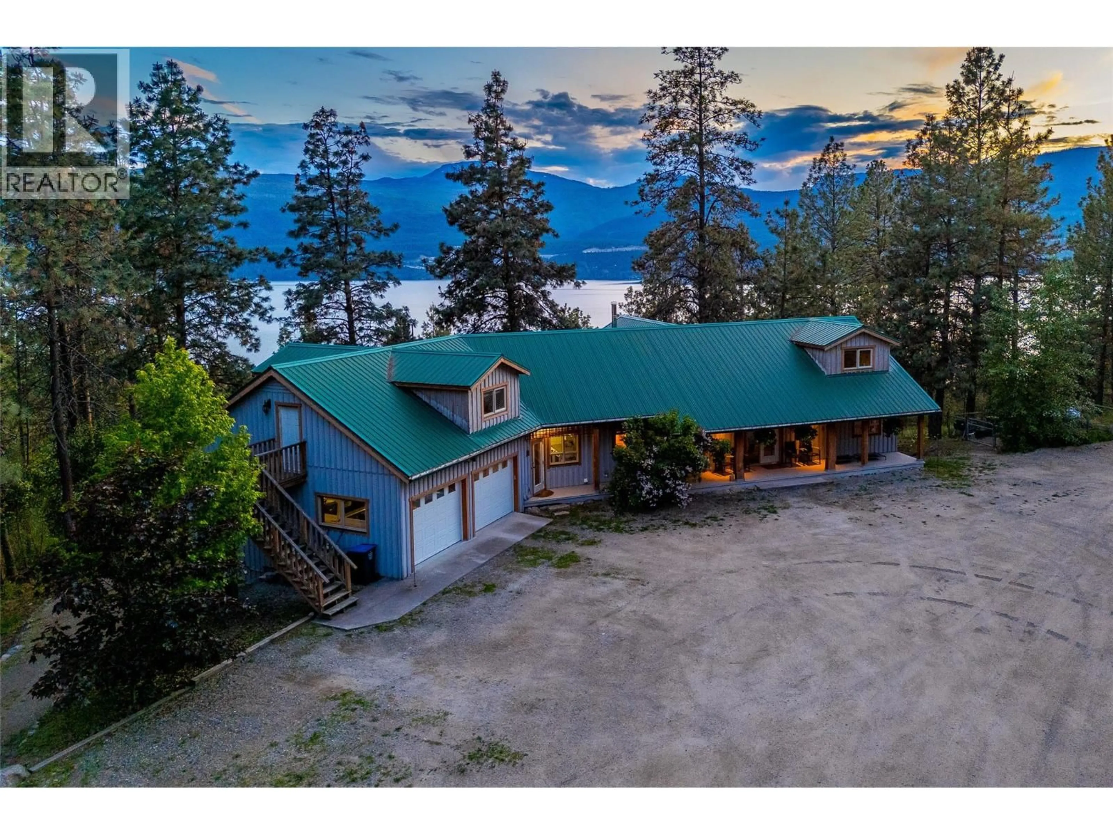 A pic from outside/outdoor area/front of a property/back of a property/a pic from drone, mountain view for 17142 COMMONAGE ROAD, Lake Country British Columbia V4V1B5