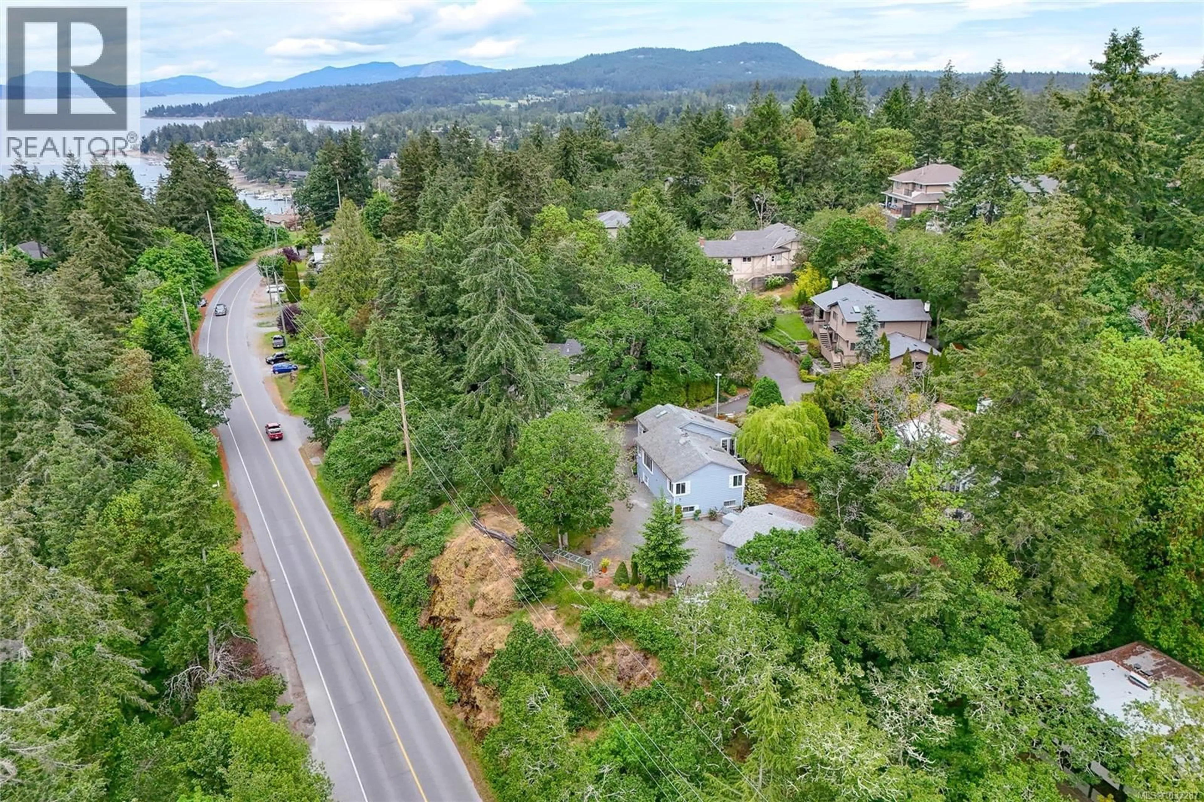 A pic from outside/outdoor area/front of a property/back of a property/a pic from drone, unknown for 2 - 6755 WALLACE DRIVE, Central Saanich British Columbia V8M1A2