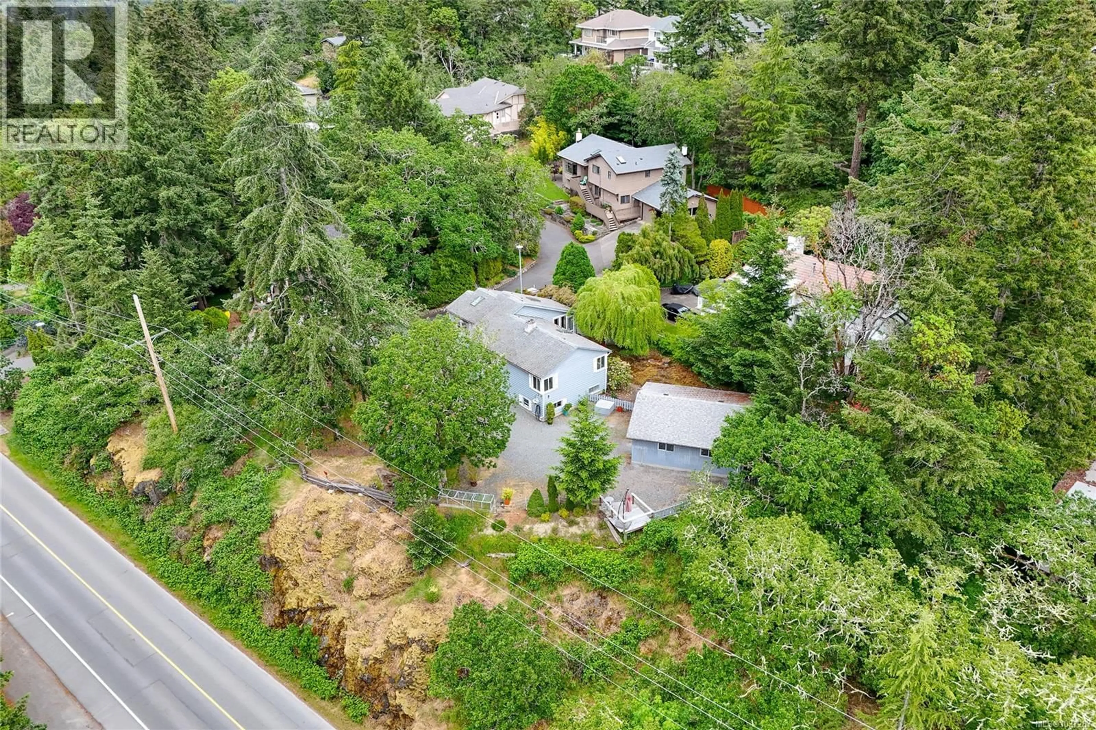 A pic from outside/outdoor area/front of a property/back of a property/a pic from drone, street for 2 - 6755 WALLACE DRIVE, Central Saanich British Columbia V8M1A2