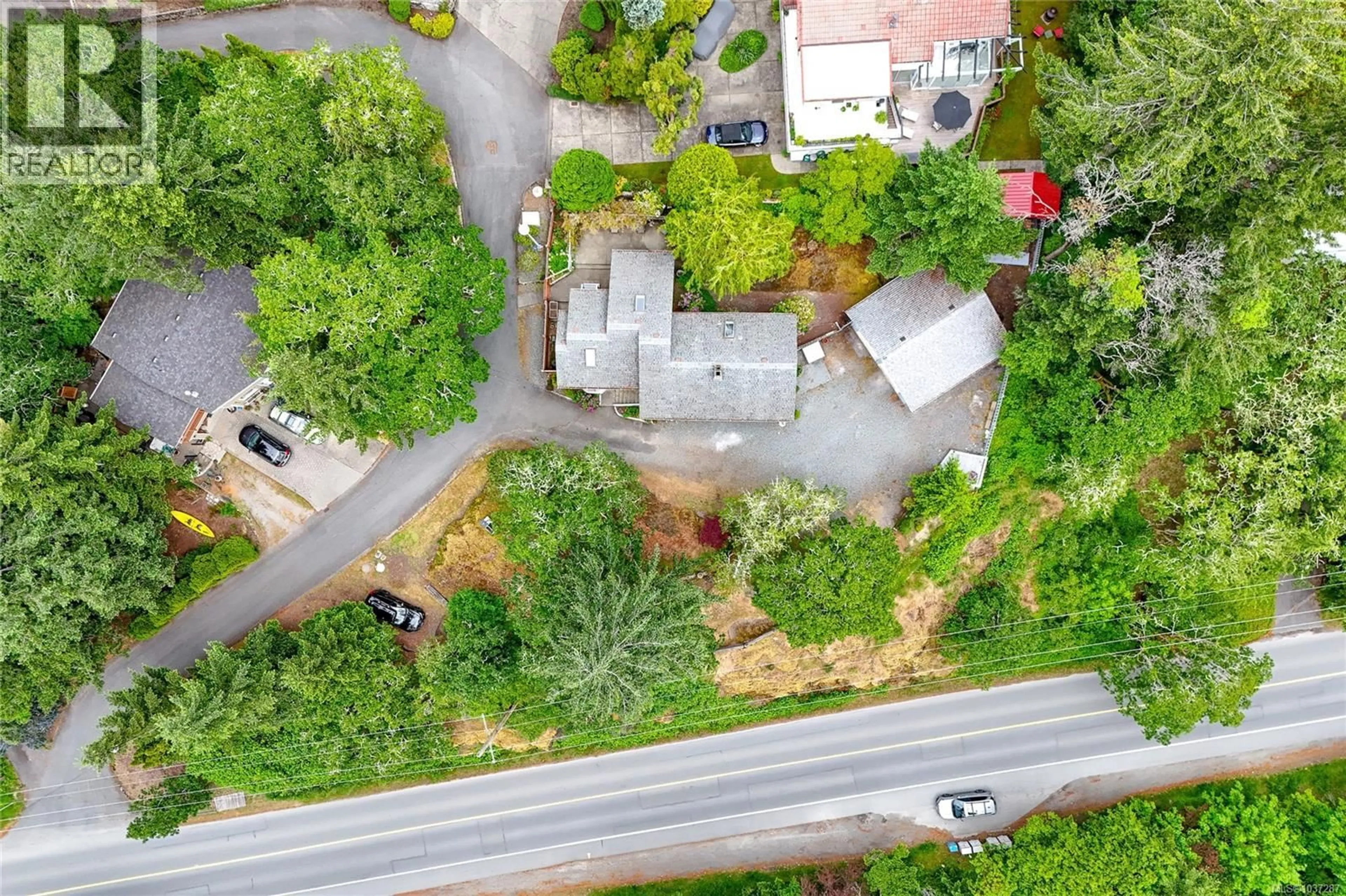 A pic from outside/outdoor area/front of a property/back of a property/a pic from drone, street for 2 - 6755 WALLACE DRIVE, Central Saanich British Columbia V8M1A2